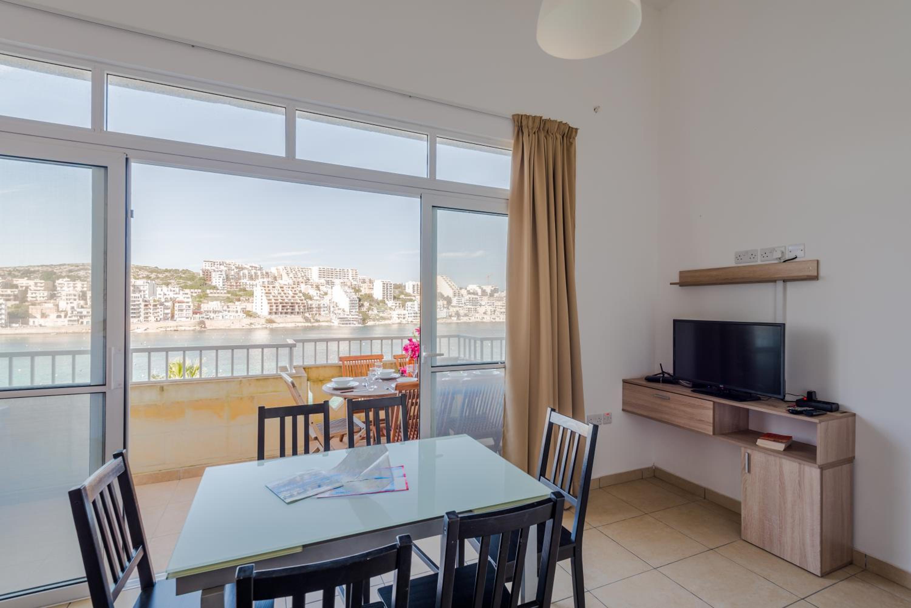 Blue Harbour Seafront 3 bedroom apartment, with spectacular sea views from terrace - by Getawaysmalta — photo 4