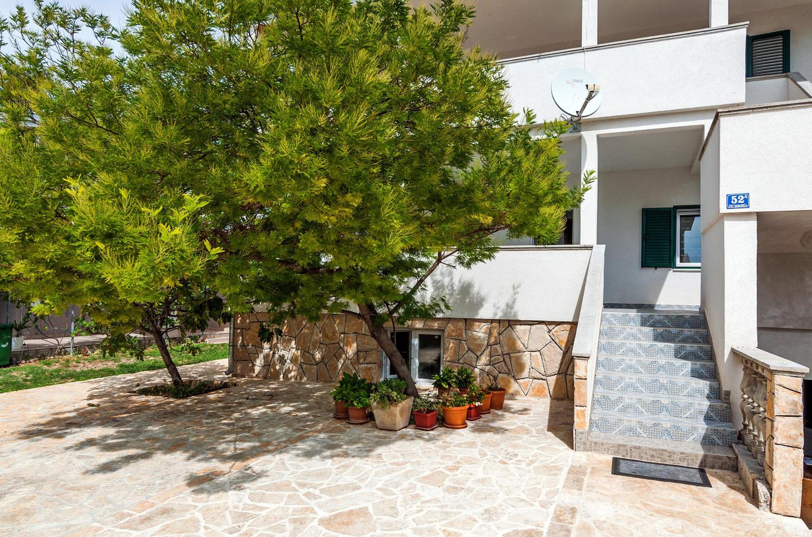 Apartman Iva-family holiday 250 m from pebble beach view 2