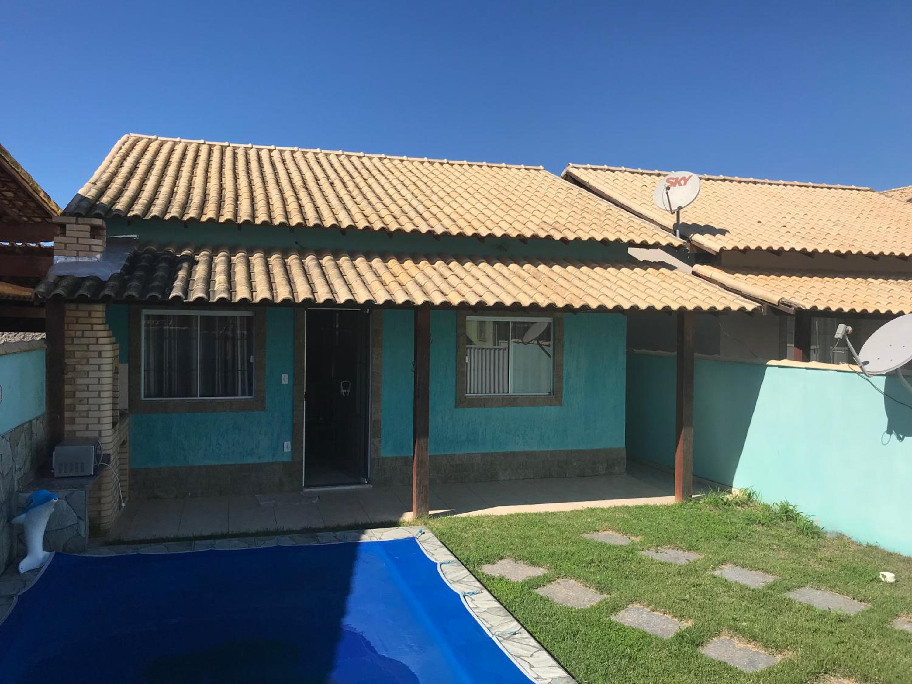 Casa com piscina, wifi e churrasqueira em unamar.