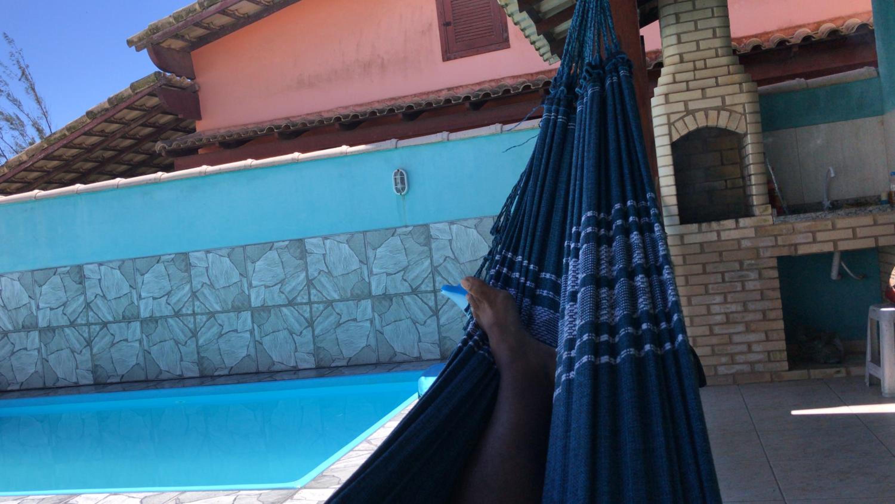 Casa com piscina, wifi e churrasqueira em unamar.