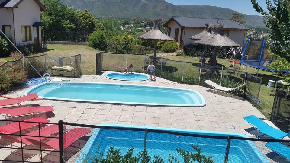 Altos del Pucara Piscina Climatizada vista a las sierras juegos Huerta Orgánica