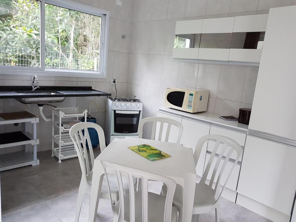 Bertioga, Praia Guaratuba, Costa do Sol - Ampla casa, nova, 4 suítes c/piscina
