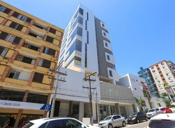 Apartamento com Piscina no Centro e a poucos metros do mar de Torres -RS