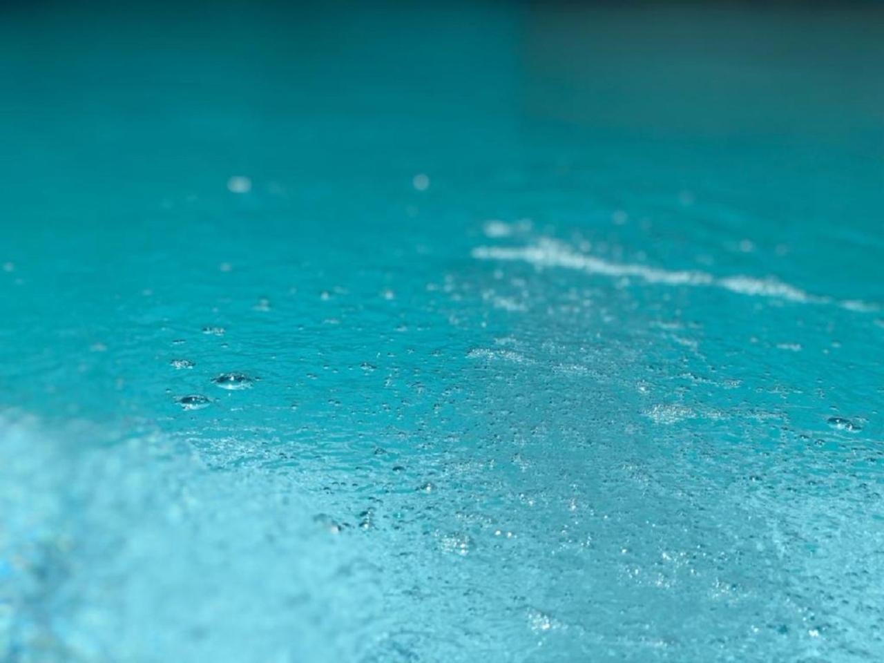 No Centro com Piscina Aquecida solar