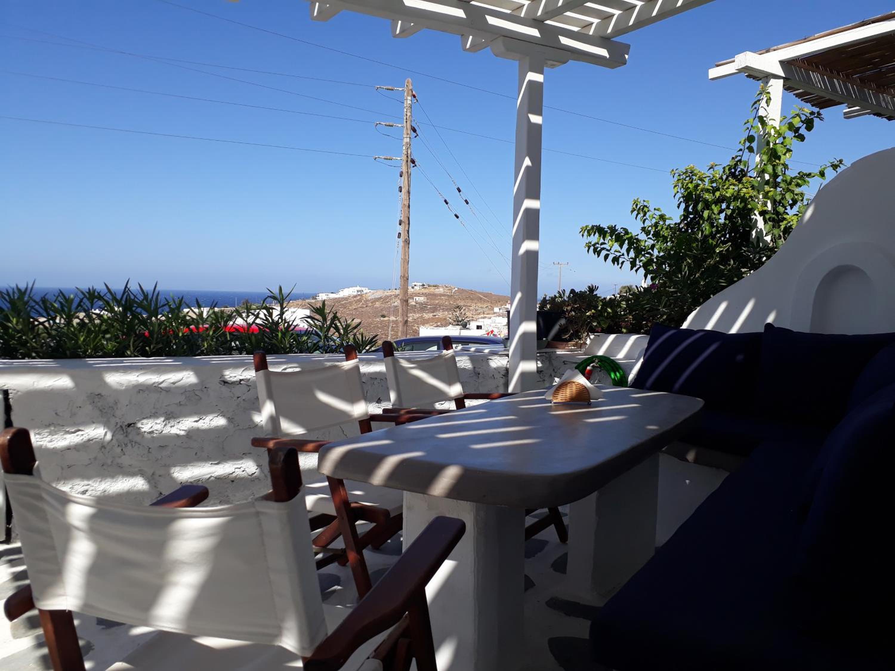 Mykonos Beachfront House with Sunset & Delos View photo 5