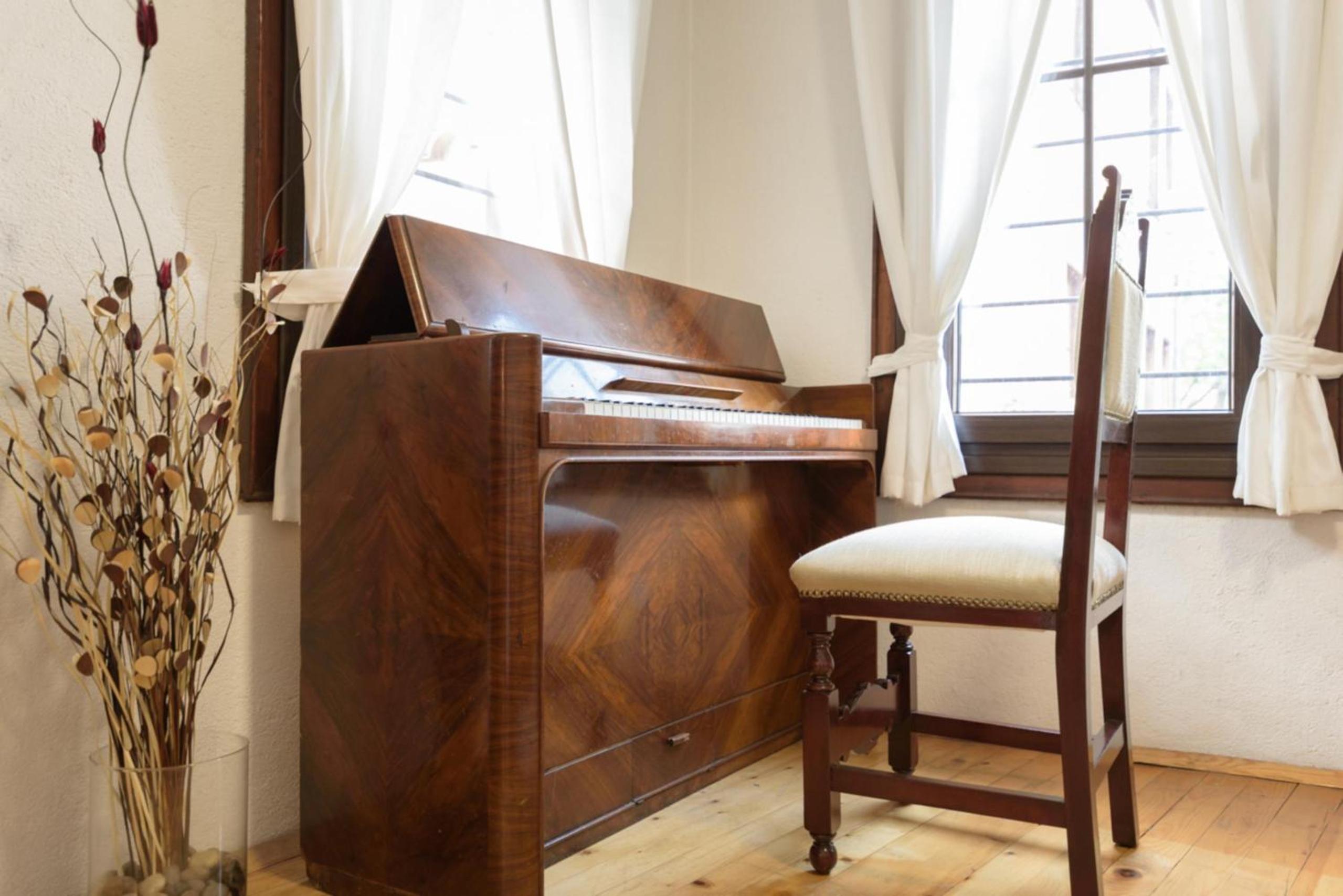 The House With The Piano