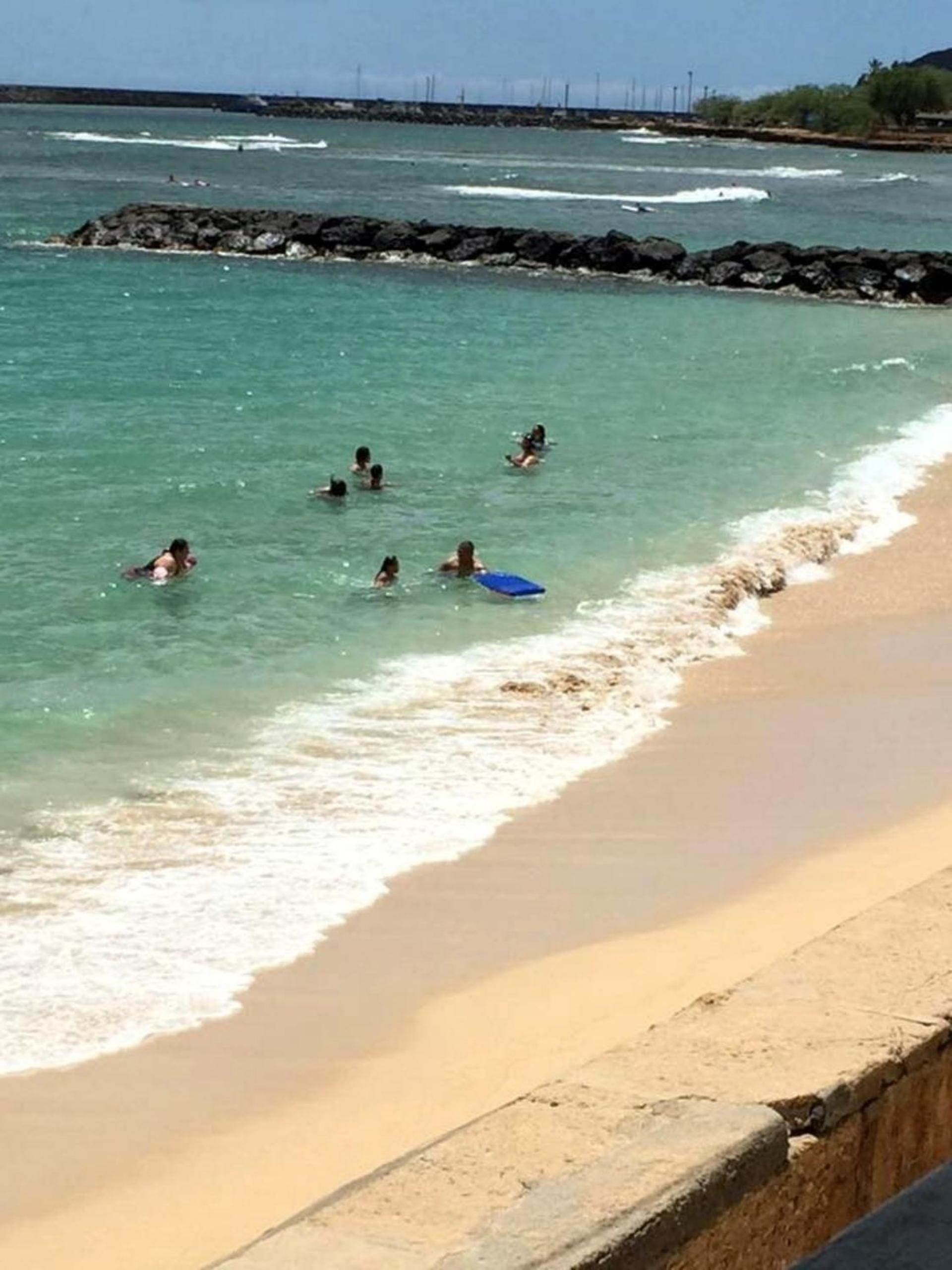 Puaehukai Beach House next to white sandy beach view 4