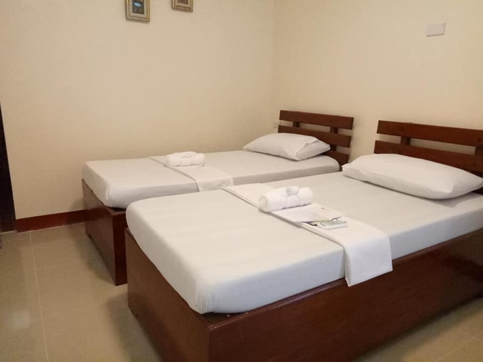 AJ Travellers Inn - Annex view 3