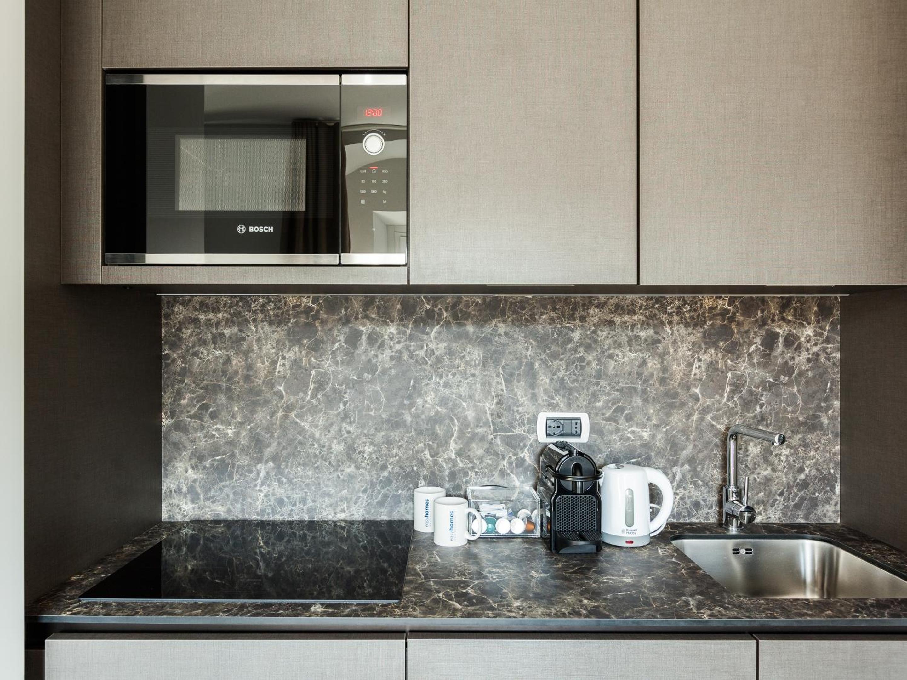 easyhomes-Duomo Suites & Apartments