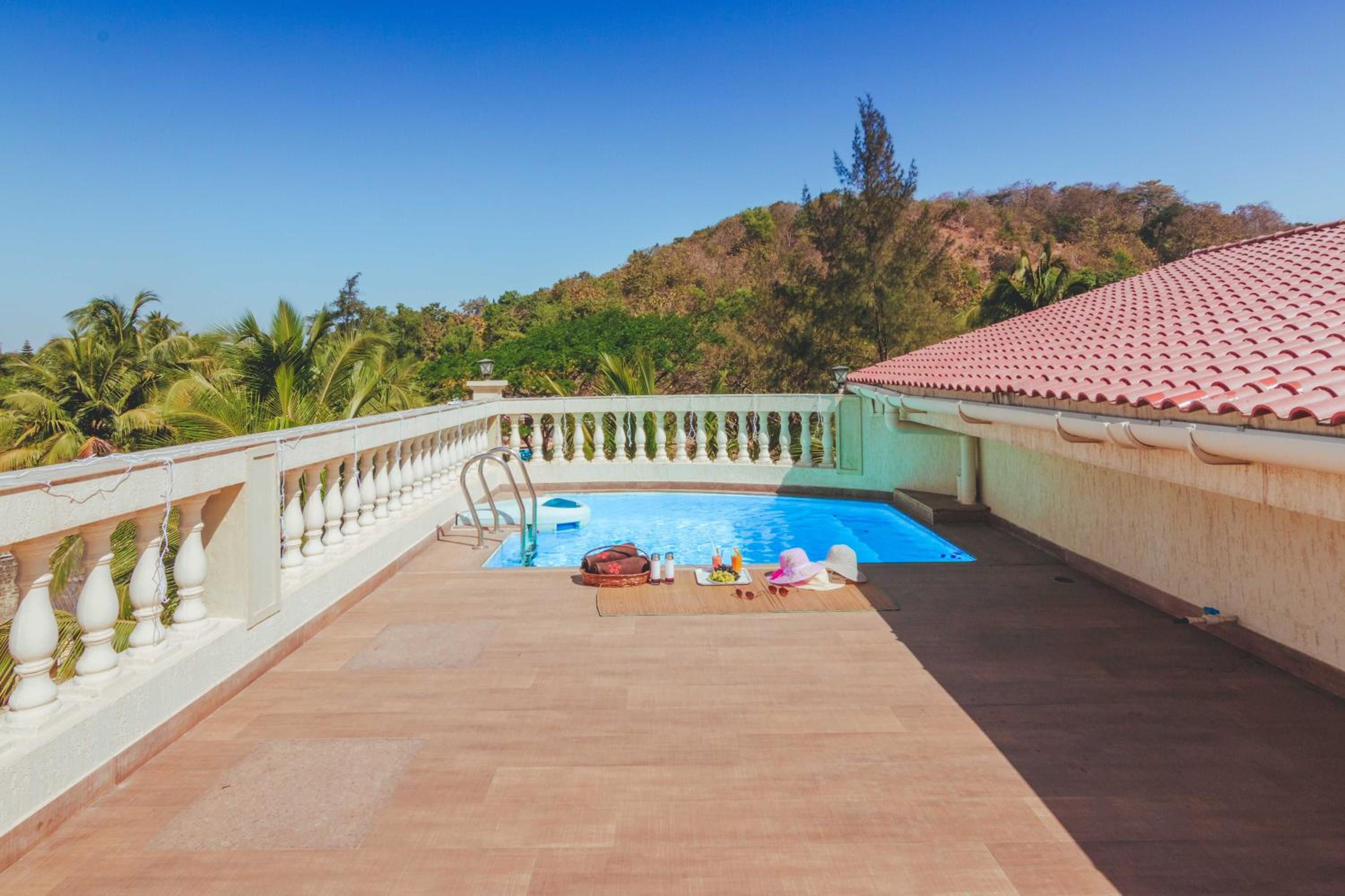 SaffronStays La Casa Maestro - Spanish 4BR villa with terrace plunge pool, coconut groves & mountain views, featured in Condé Nast view 3