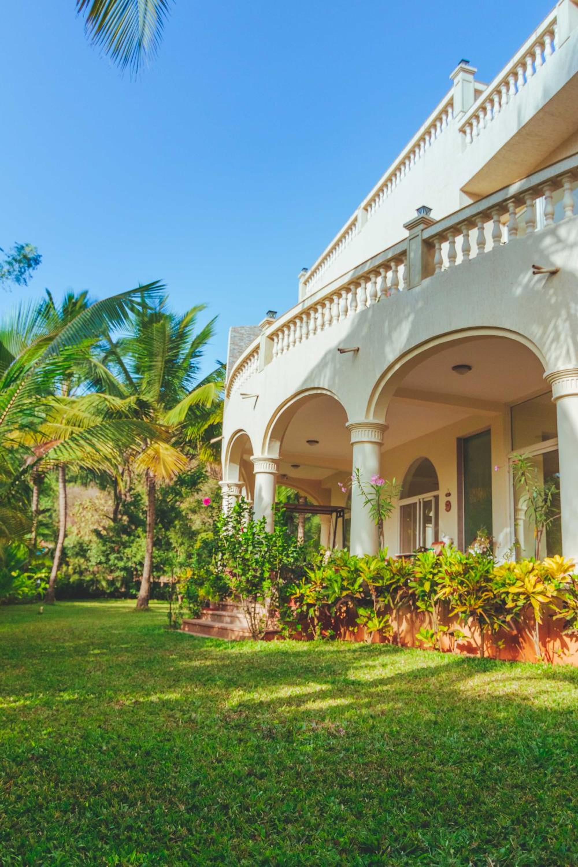 SaffronStays La Casa Maestro - Spanish 4BR villa with terrace plunge pool, coconut groves & mountain views, featured in Condé Nast view 2