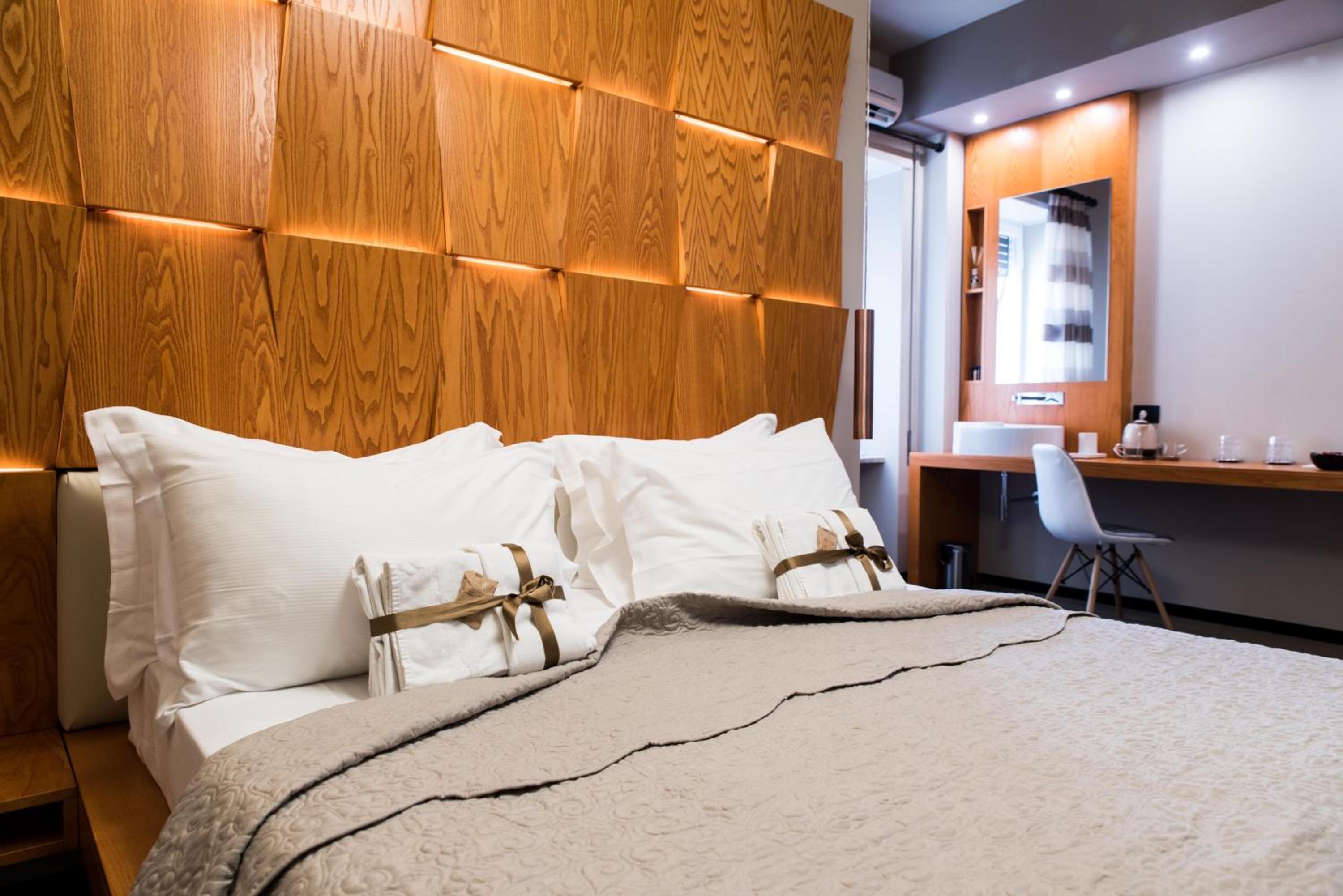 Unicum Vite en Rome — hotel room