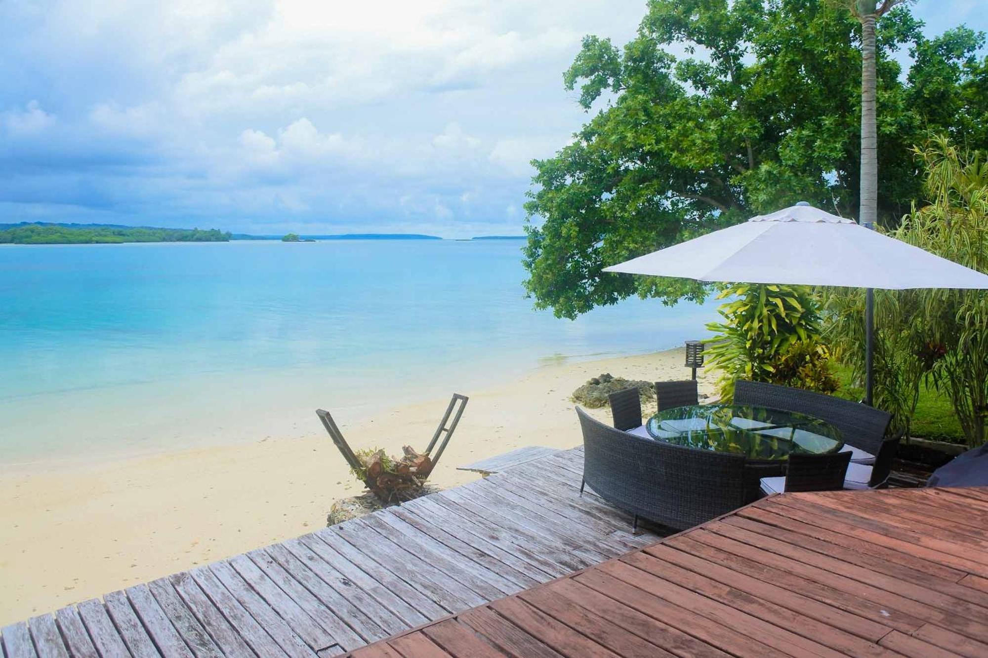 Santo Sunset Beach Villas on Surunda Bay view 4