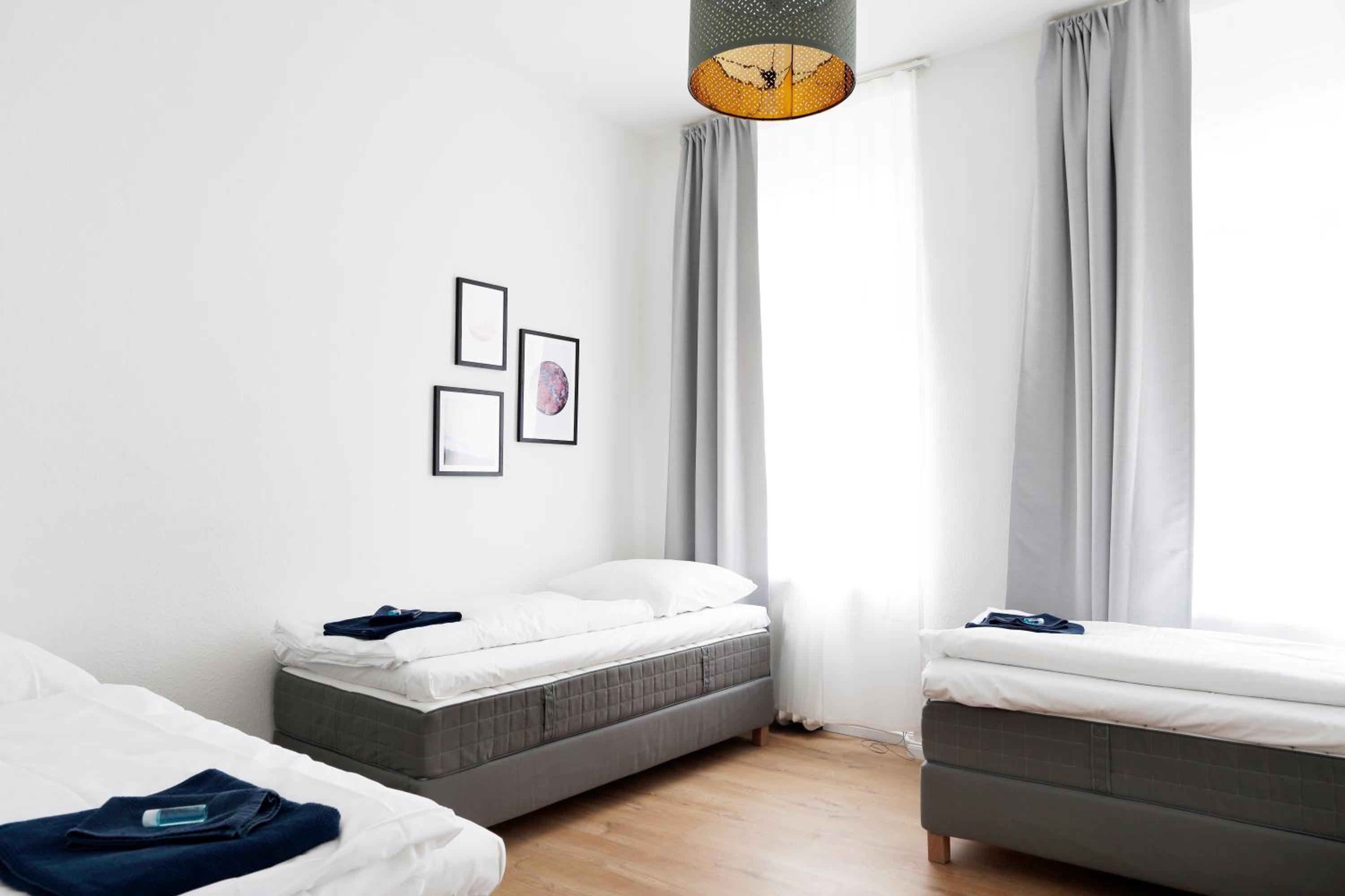GREIF by ROCKCHAIR Apartments l SUPERHOST Status l 2 Bedrooms Boxspringbeds in City Center - Cozy Family & Business Flair welcomes you!