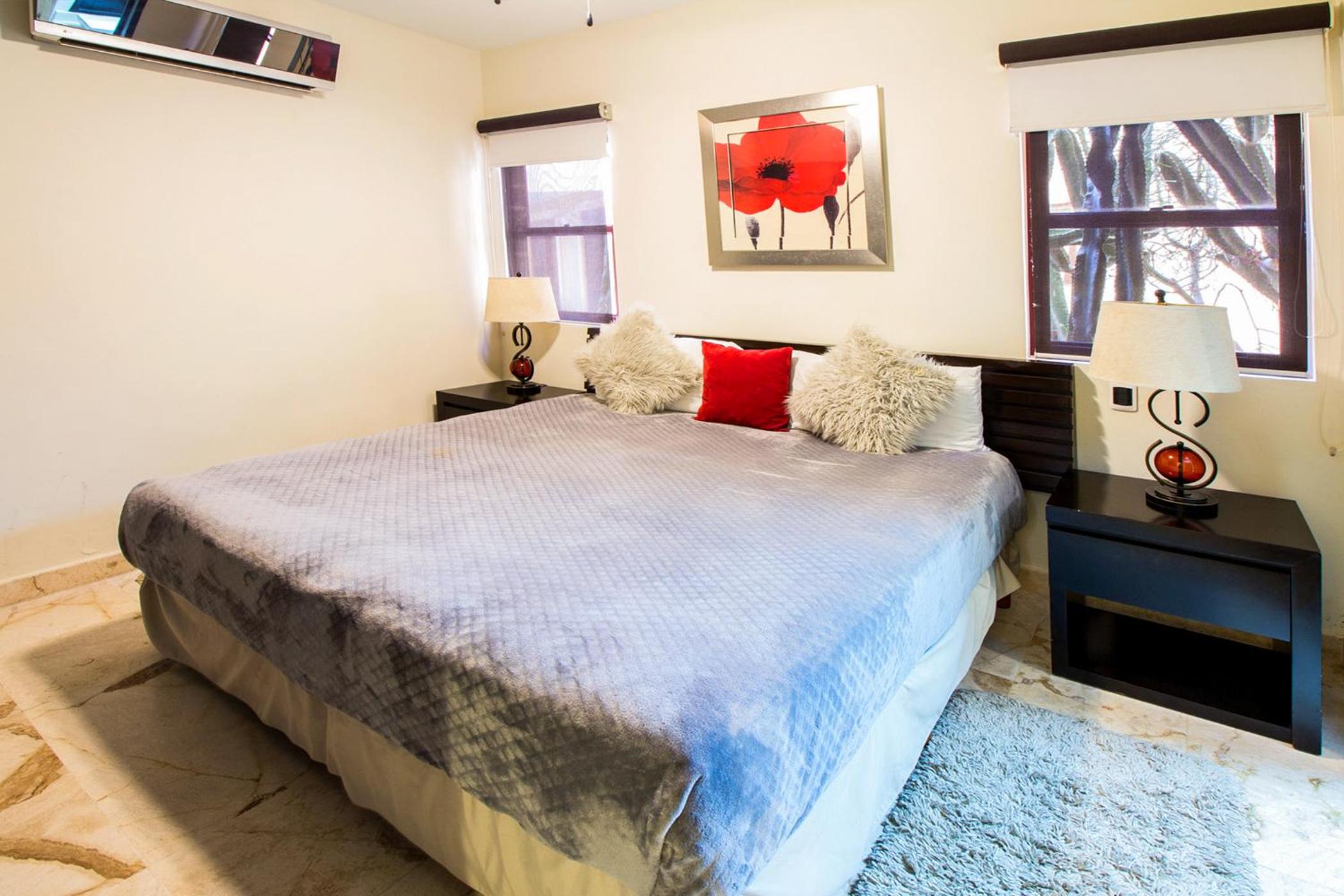 Ground floor, luxury 1 bedroom condo with pool view at El Faro by DPM
