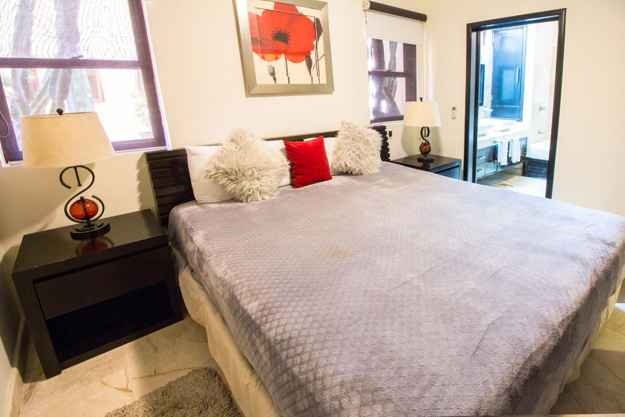Ground floor, luxury 1 bedroom condo with pool view at El Faro by DPM