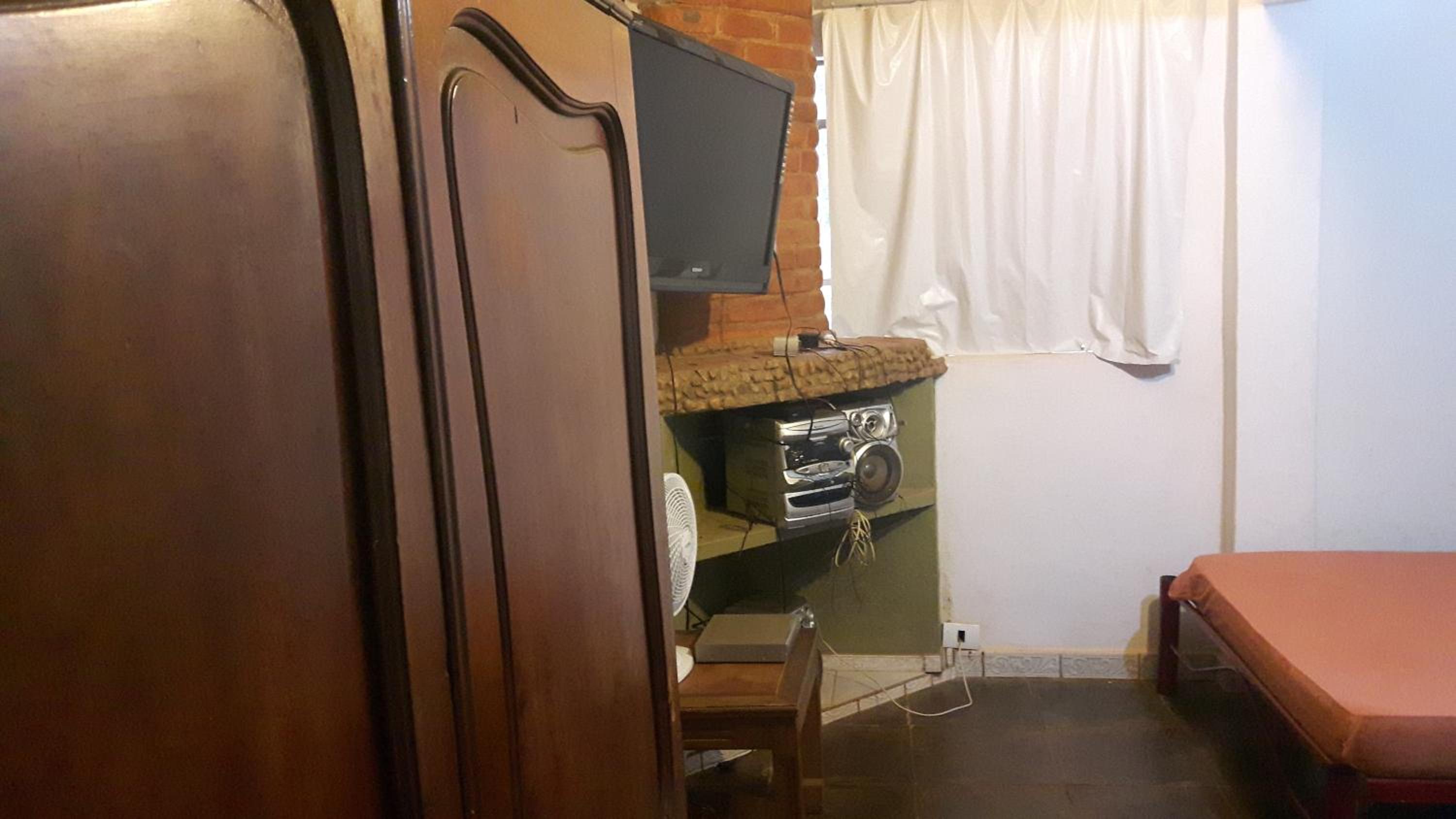 Casa dois andares com área de churrasco em Ibitipoca