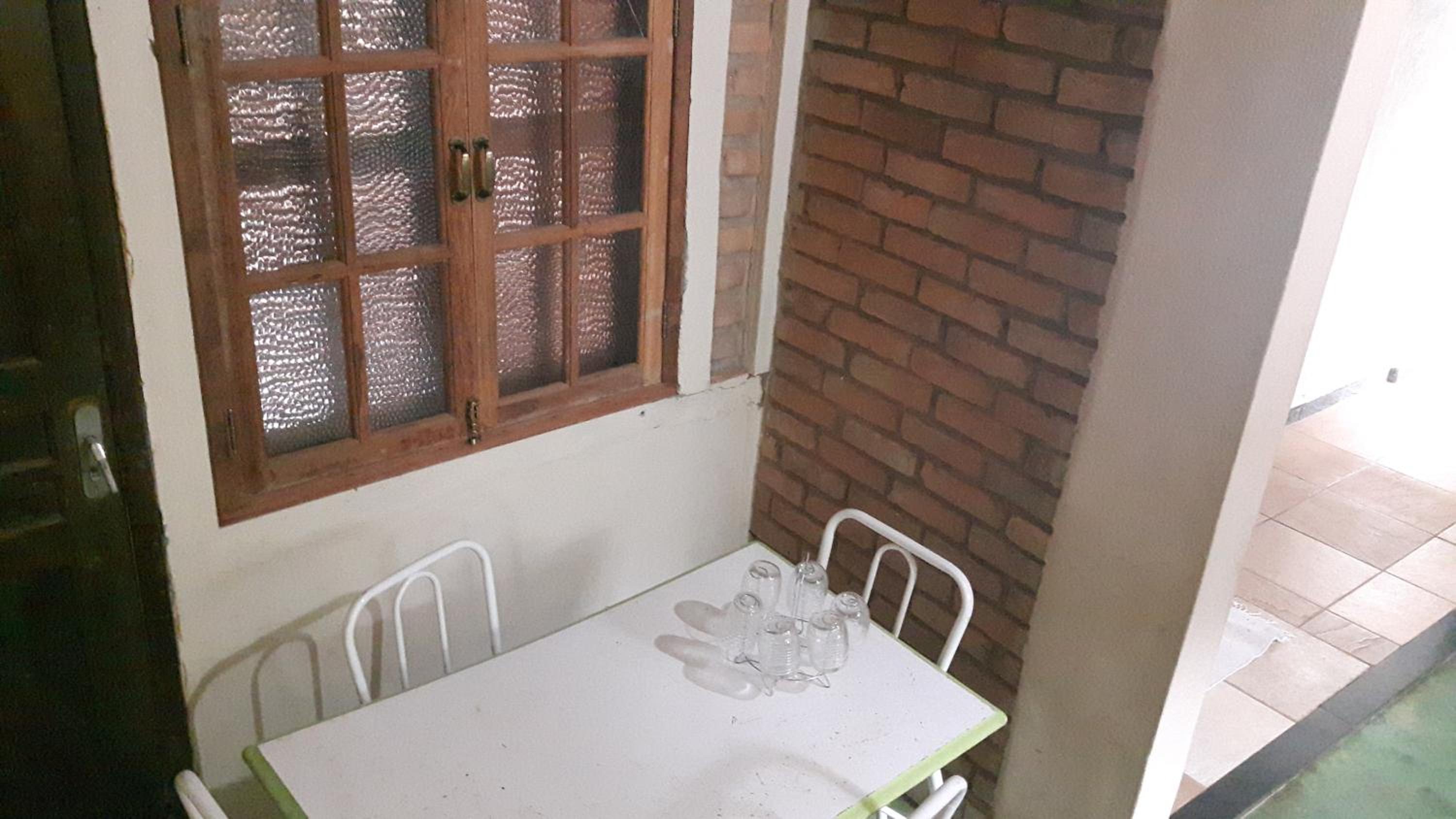 Casa dois andares com área de churrasco em Ibitipoca