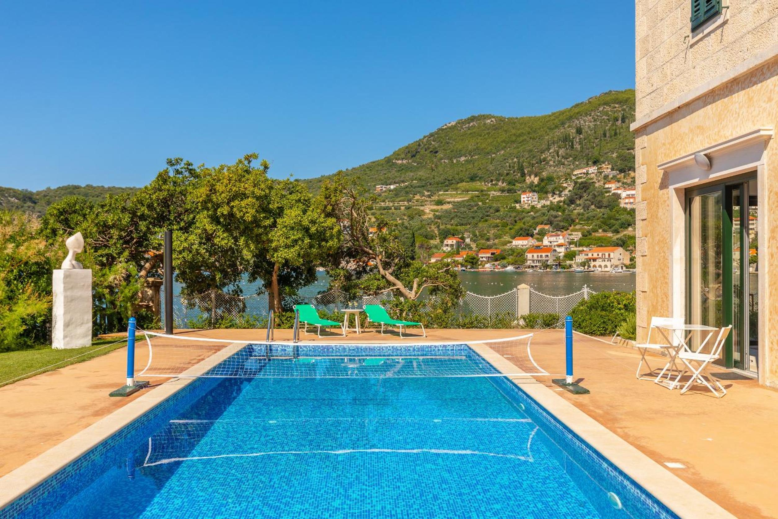Villa Dubravka - heated outdoor pool and indoor jacuzzi view 4