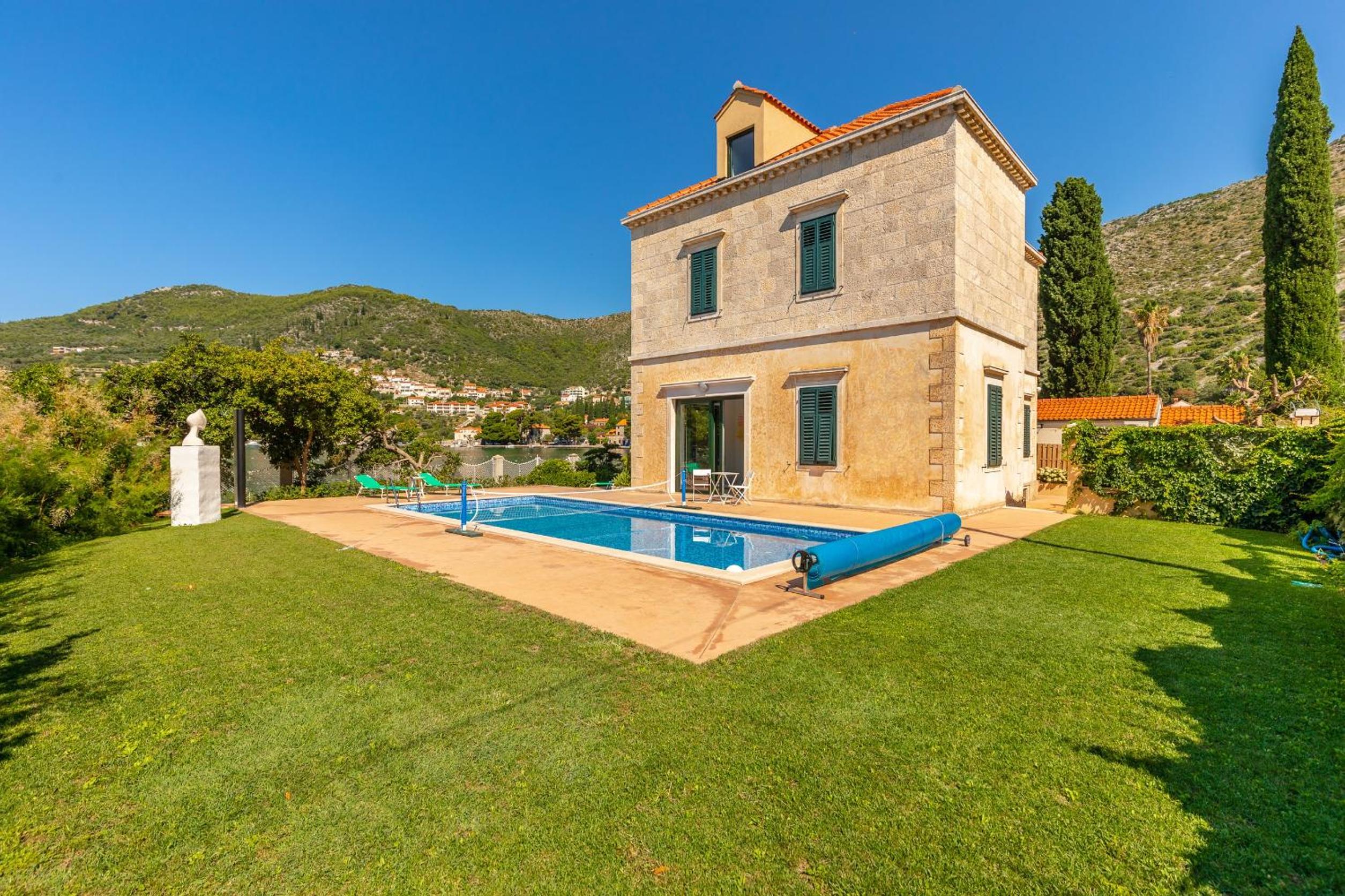 Villa Dubravka - heated outdoor pool and indoor jacuzzi view 2
