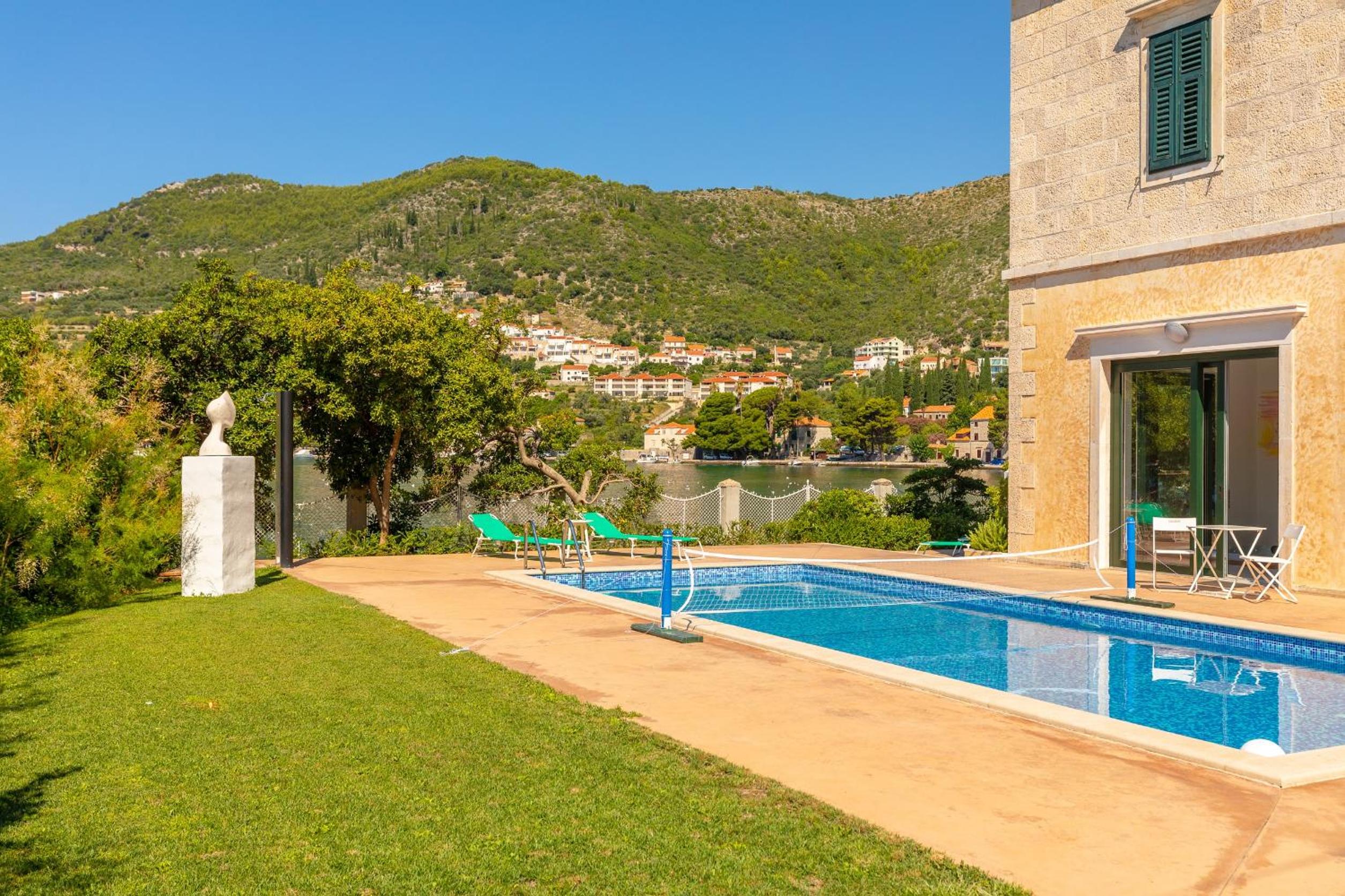 Villa Dubravka - heated outdoor pool and indoor jacuzzi view 3