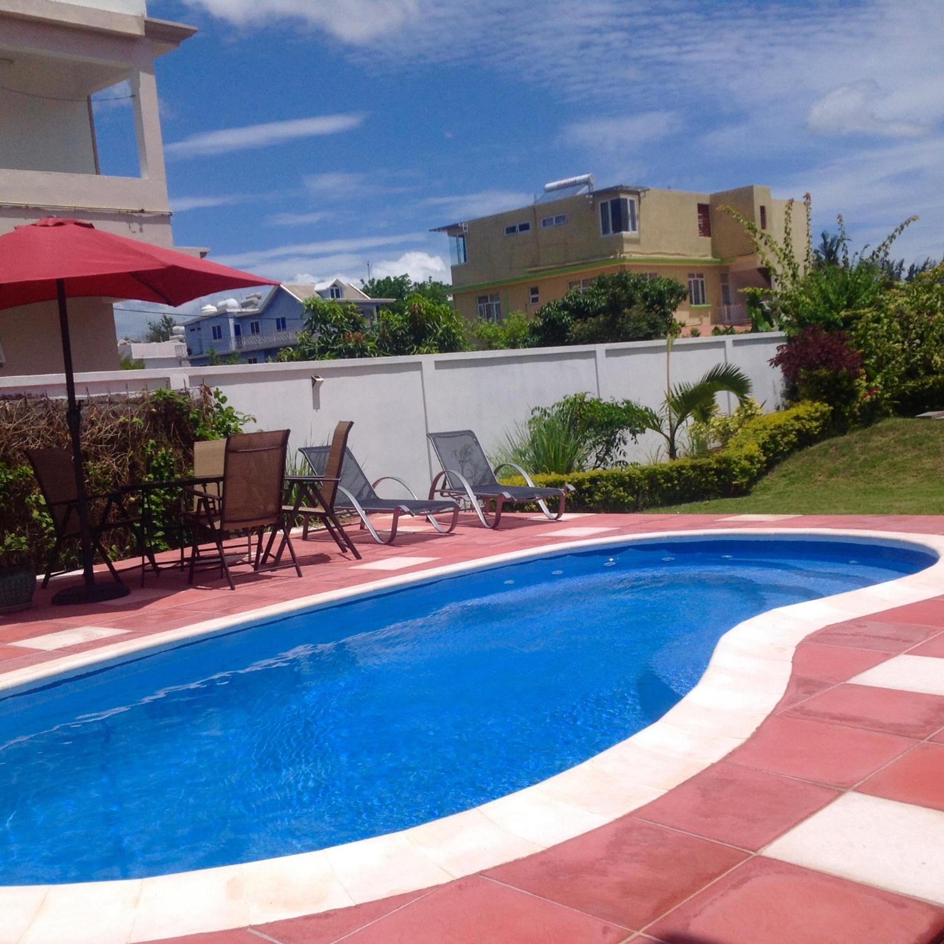 Fayruz Villa is a 3 bedroom, 3 bathroom detached house with AC and swimming pool 5 minutes walk from Flic en Flac public beach view 3