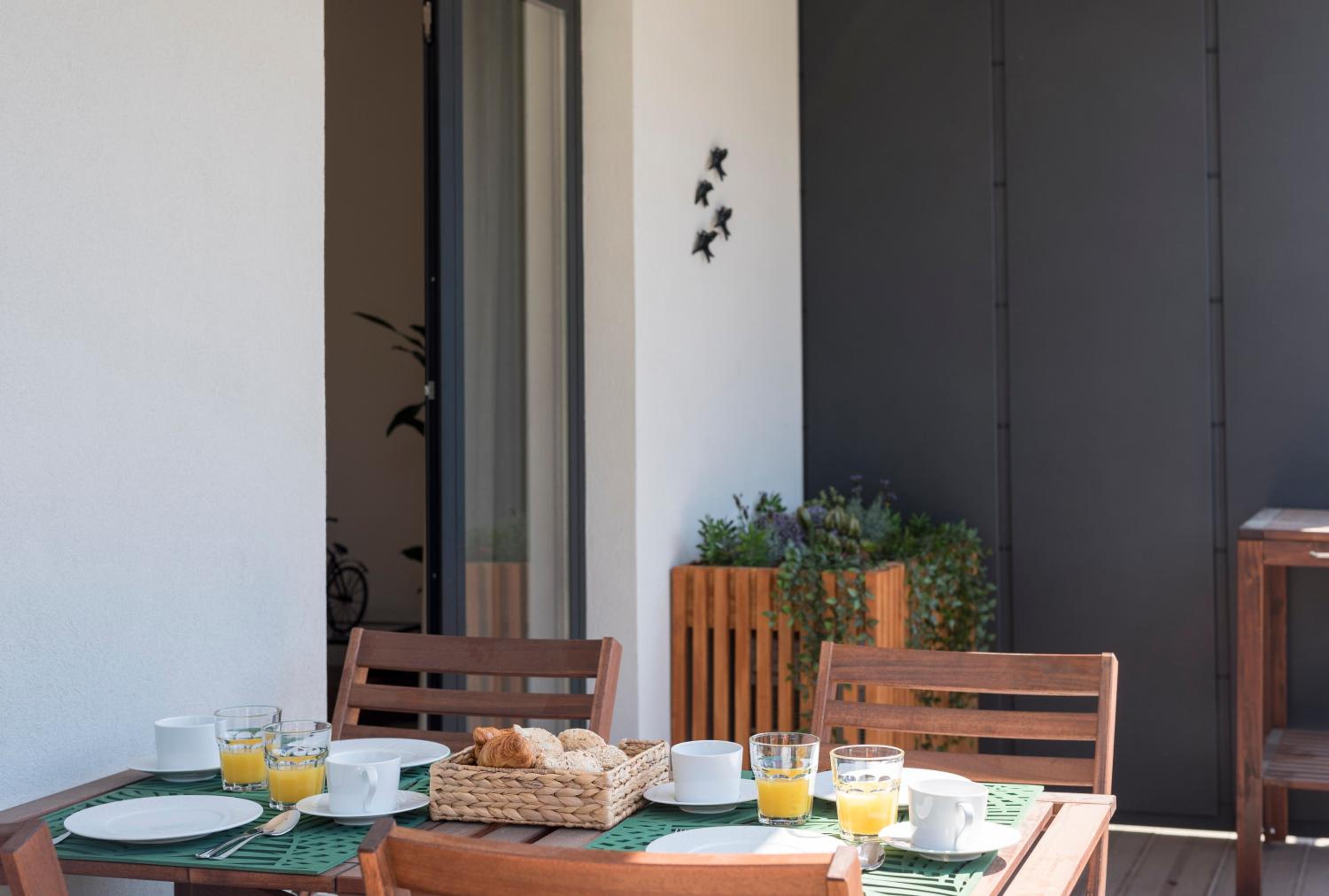 LovelyStay - Downtown Balcony Apartment with Free Parking view 3