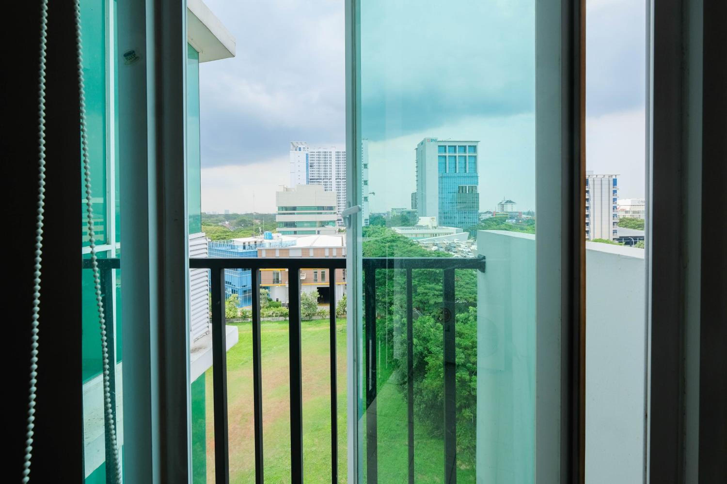 Great Location Studio at Tree Park Apartment By Travelio view 2