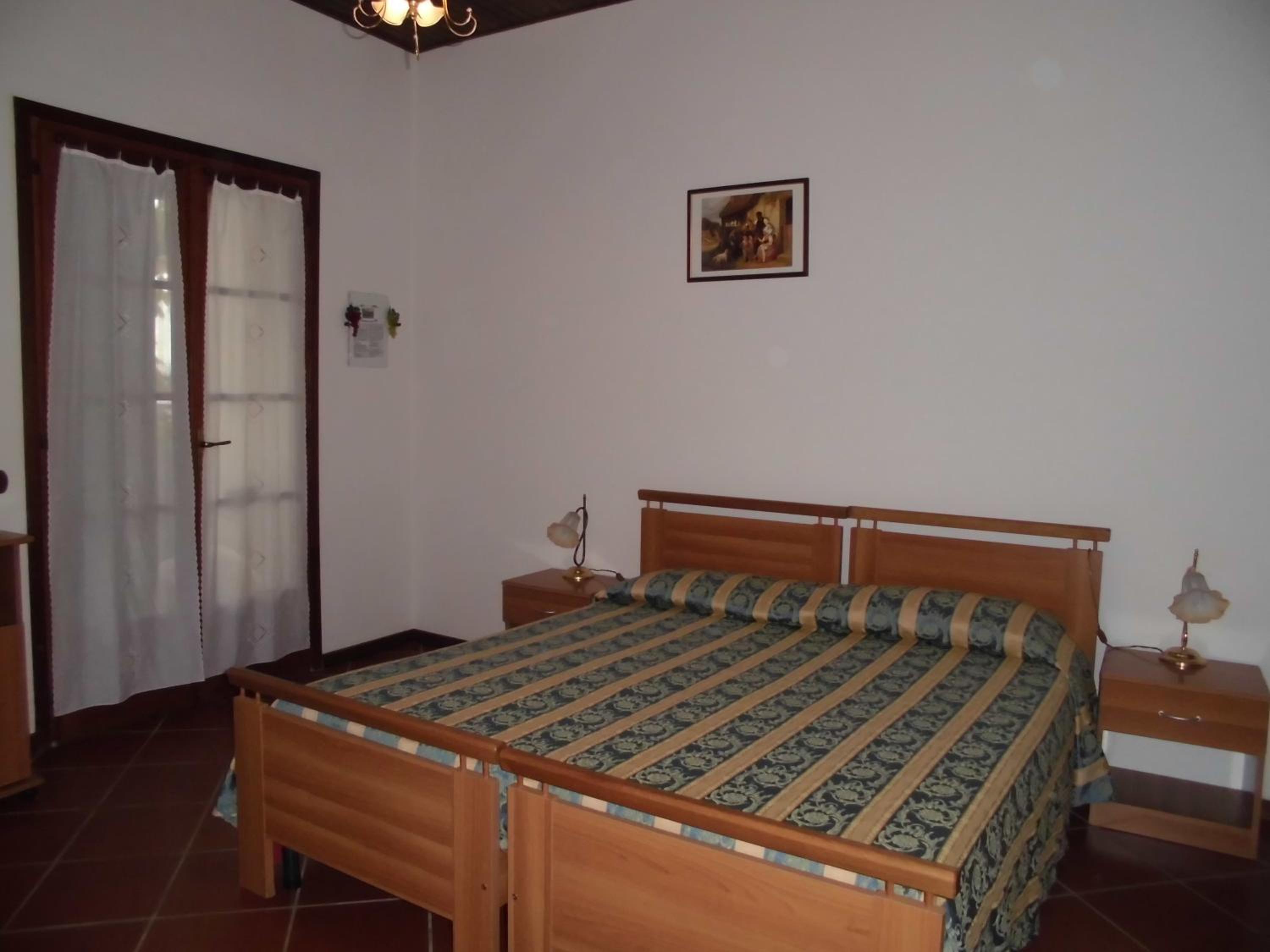 B&B Il Vigneto en Capoterra — hotel room