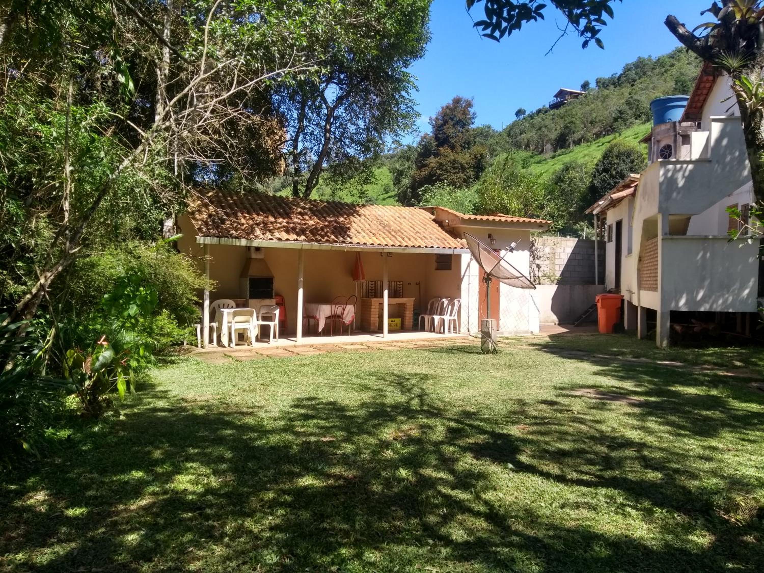 Casa dois andares com área de churrasco em Ibitipoca