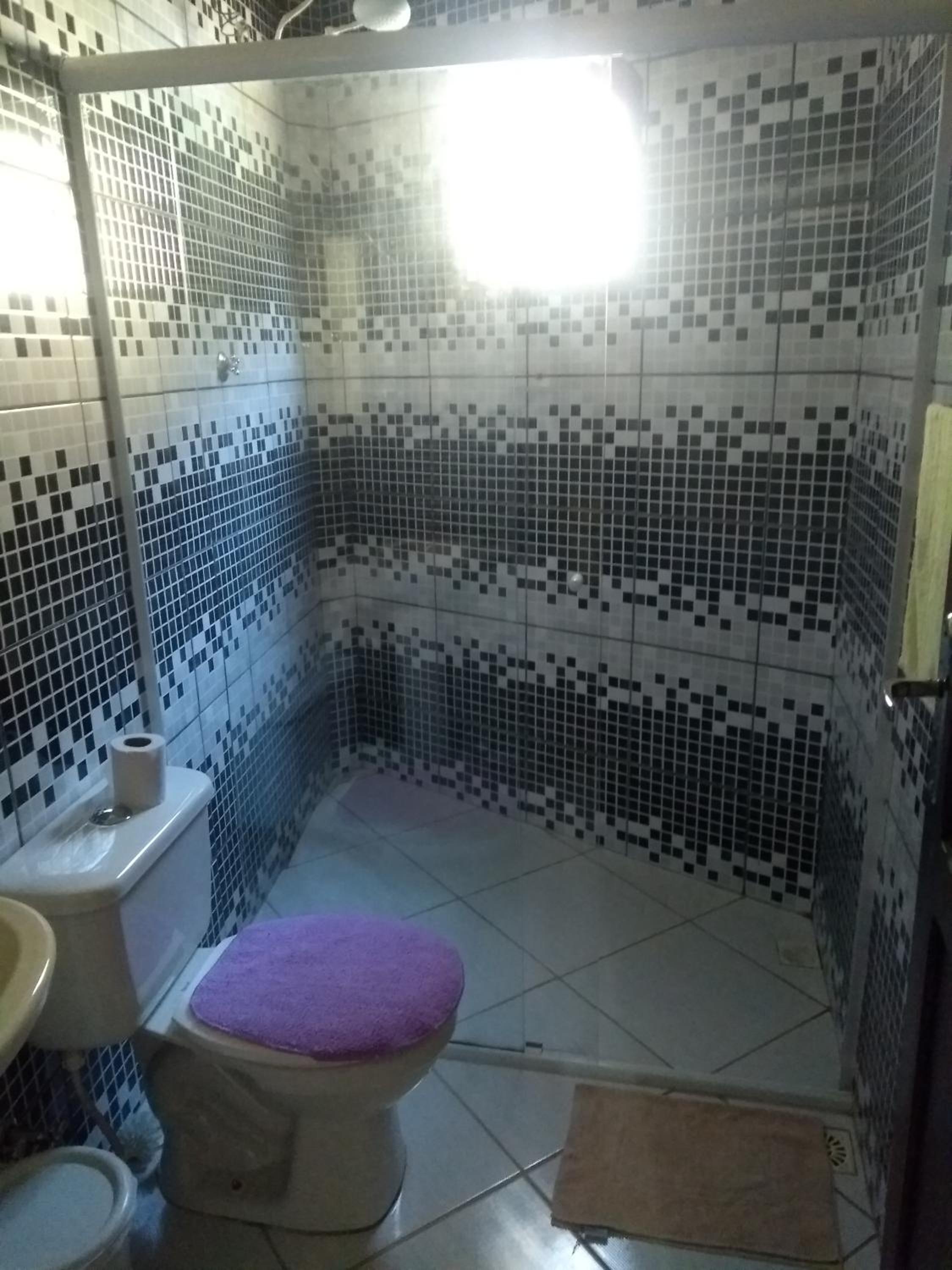 Casa dois andares com área de churrasco em Ibitipoca