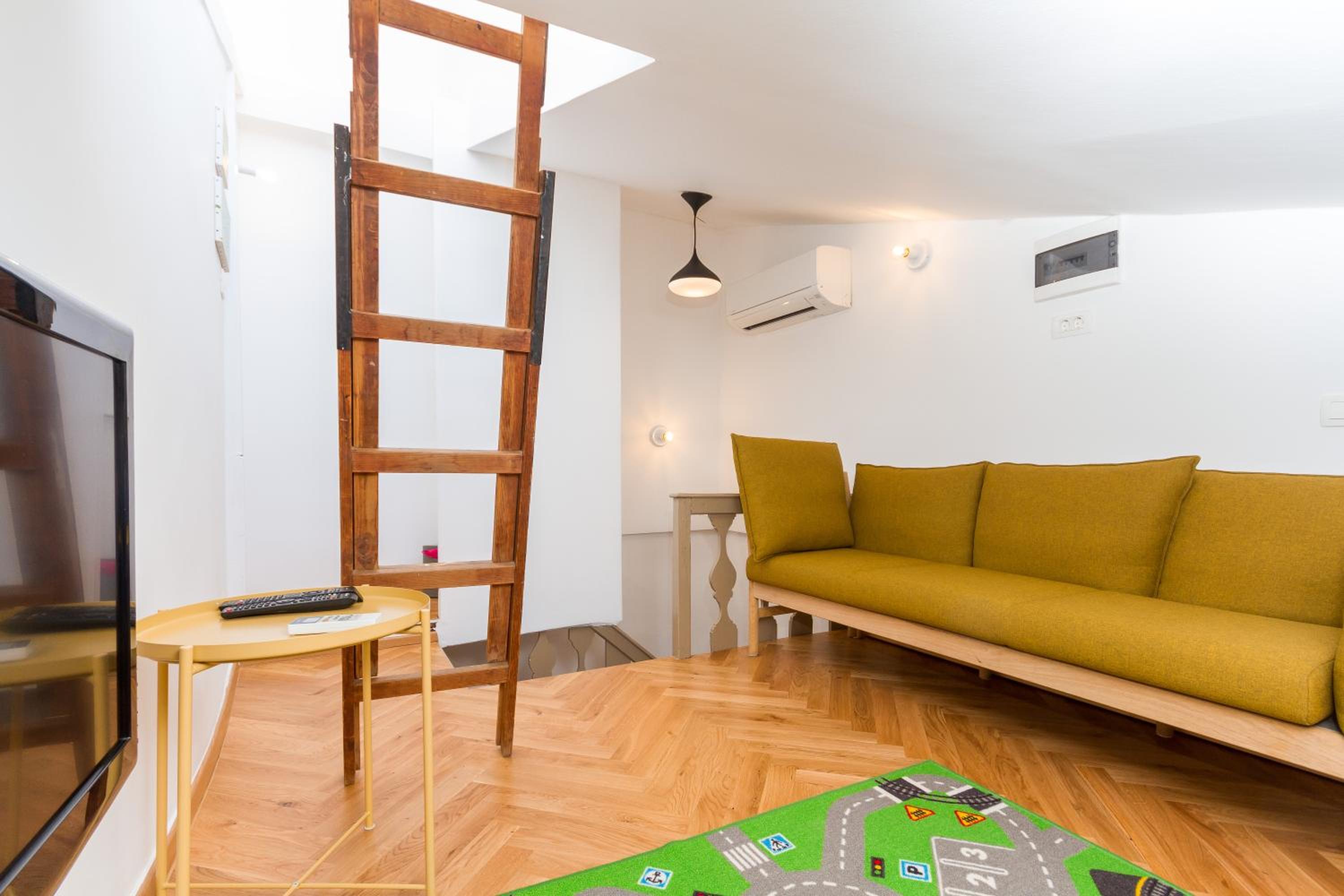 Little Tower With Terrace by Locap Group view 2