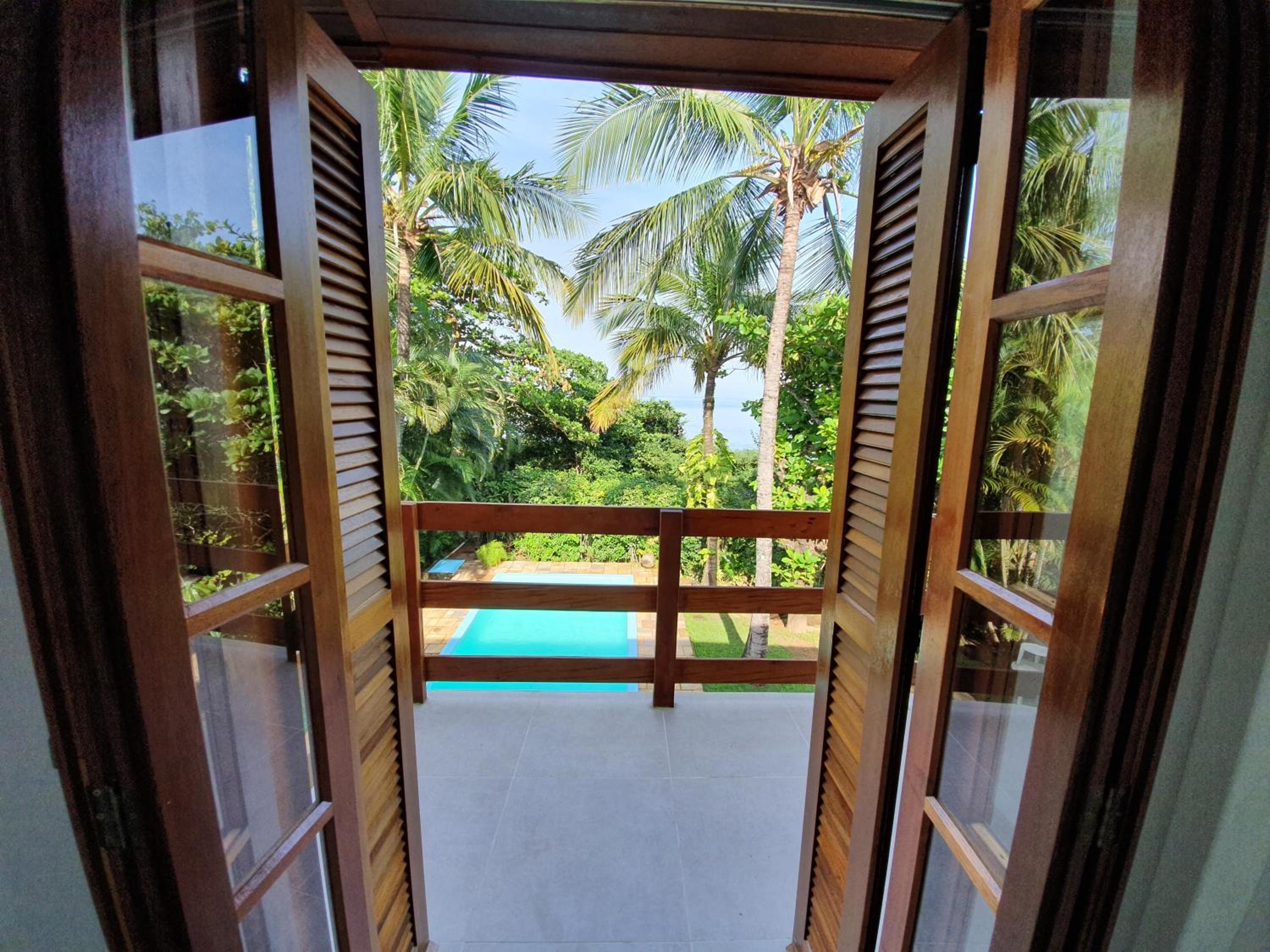 Casa pé na areia em Toque Toque