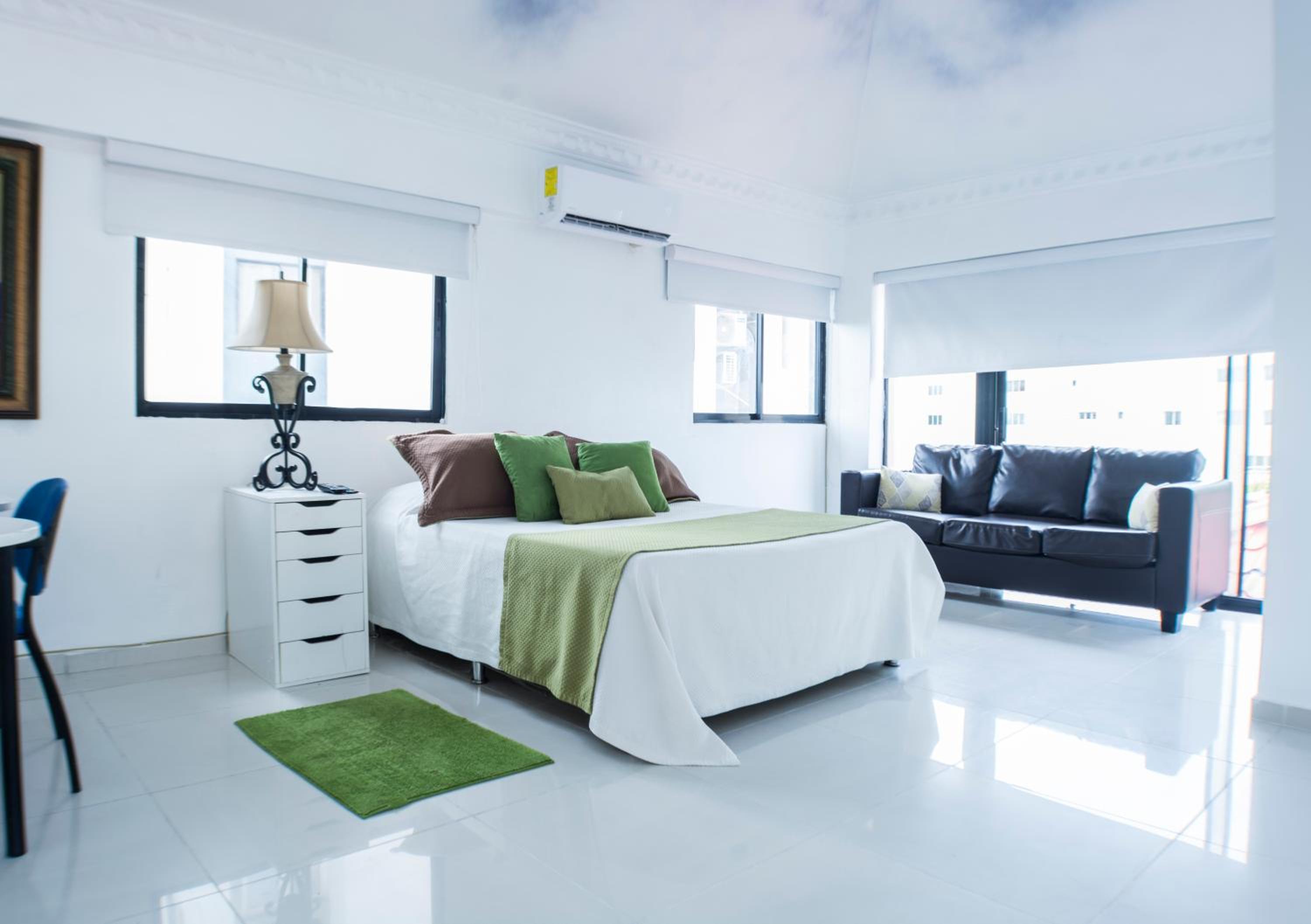 Malecon Rooms y Hotel