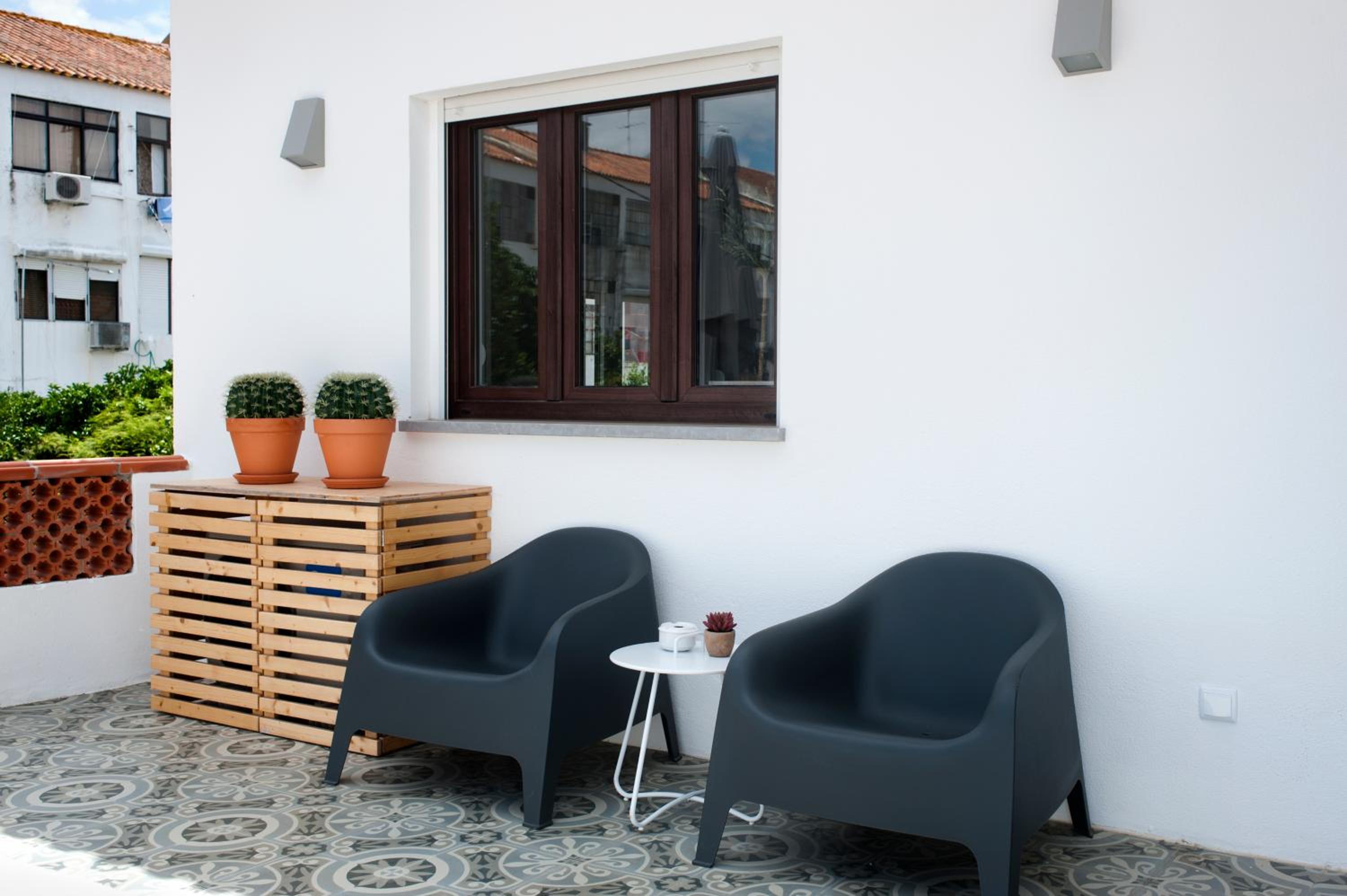 Hotel Apartamento modeno e acolhedor com terraço - Image 1