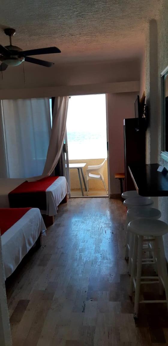 Ocean Front Suite, balcony, kitchen.