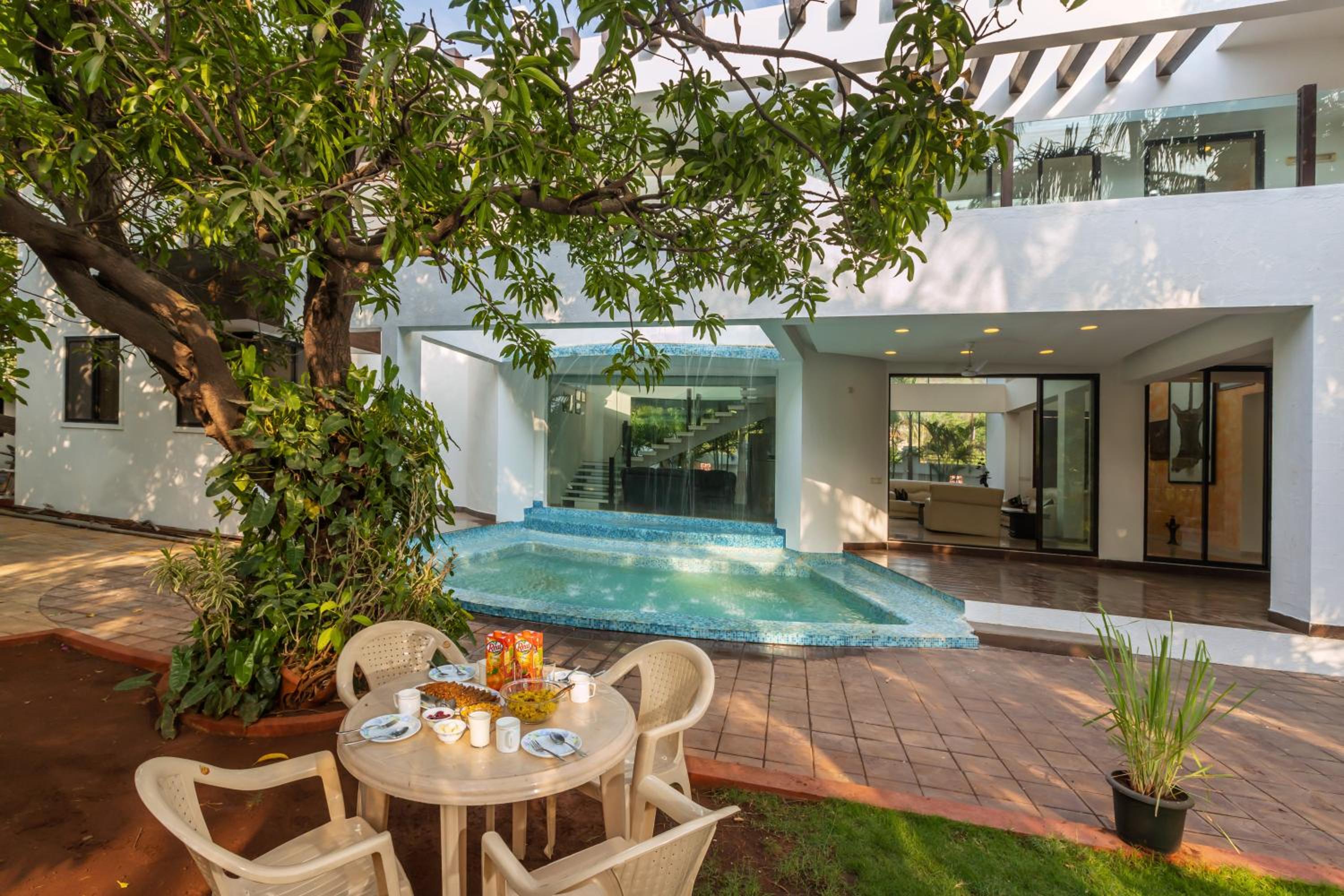 SaffronStays Vedanta - 5BR luxury villa with plunge pool, game zone, lawn & Tungarli Lake nearby view 4