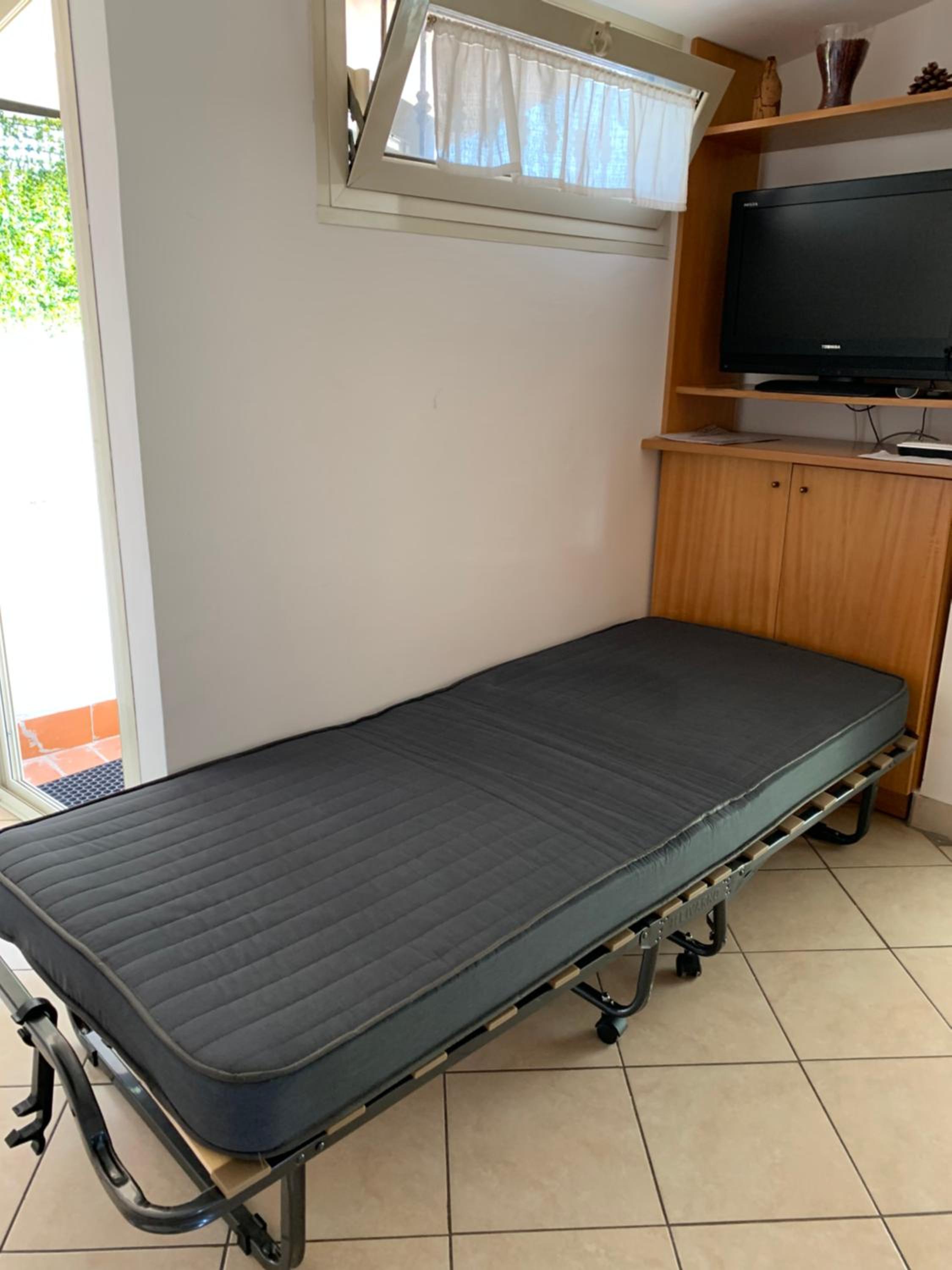 Mansarda 25 en Terracina — bedroom
