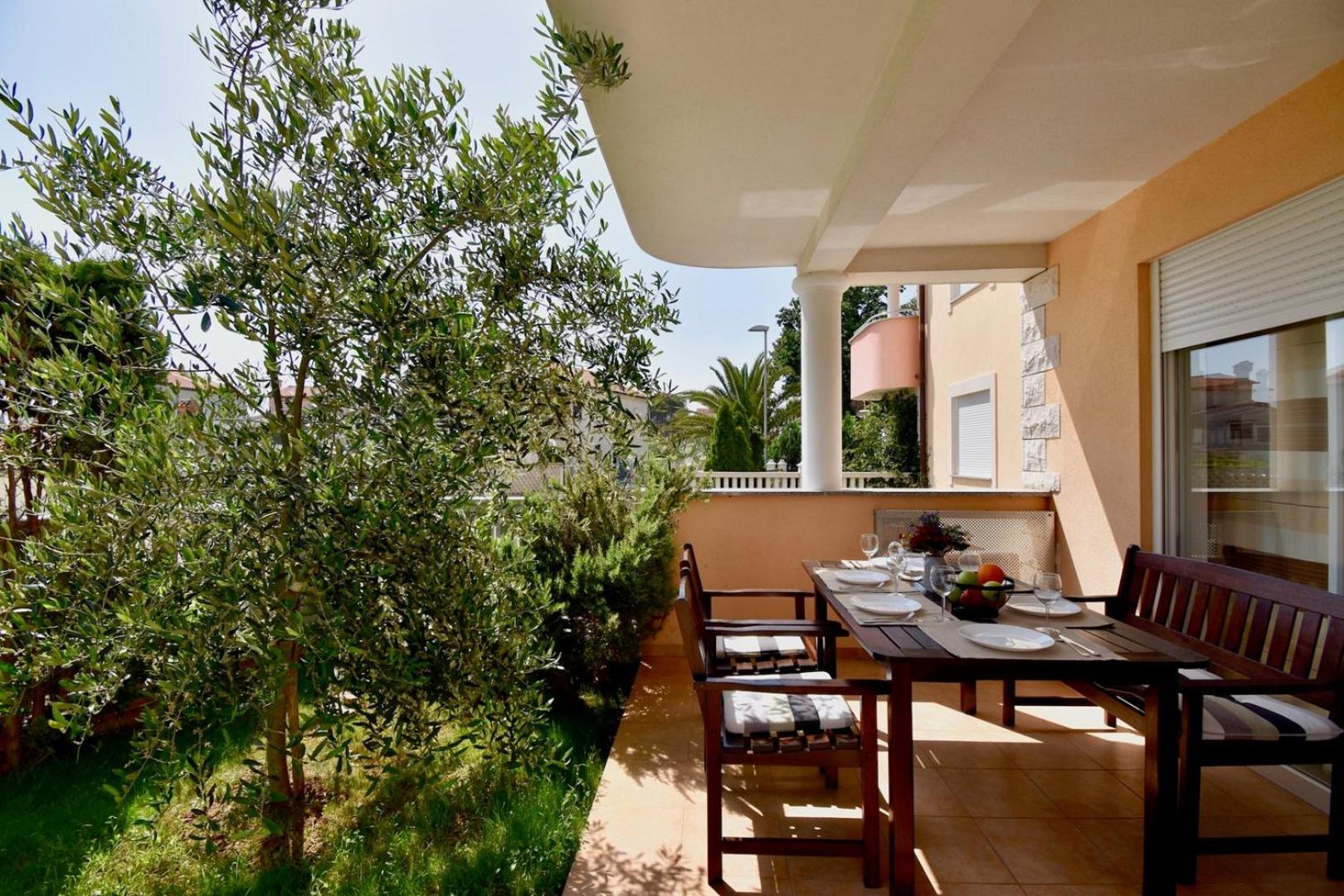 Spacious apartment with the garden, near the sandy beach view 5