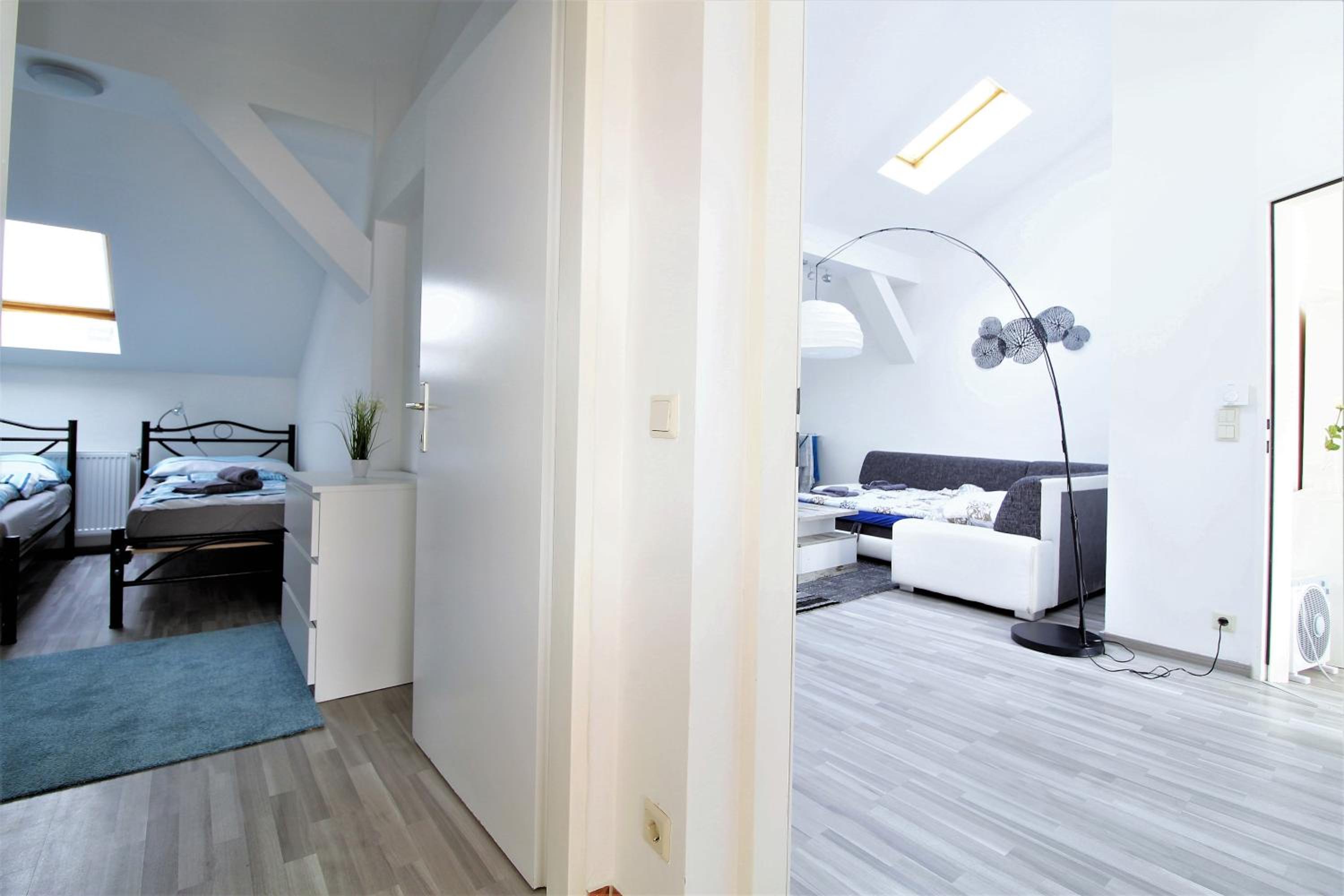 Light-Filled 4-Bedroom Attic Flat with Air Conditioning