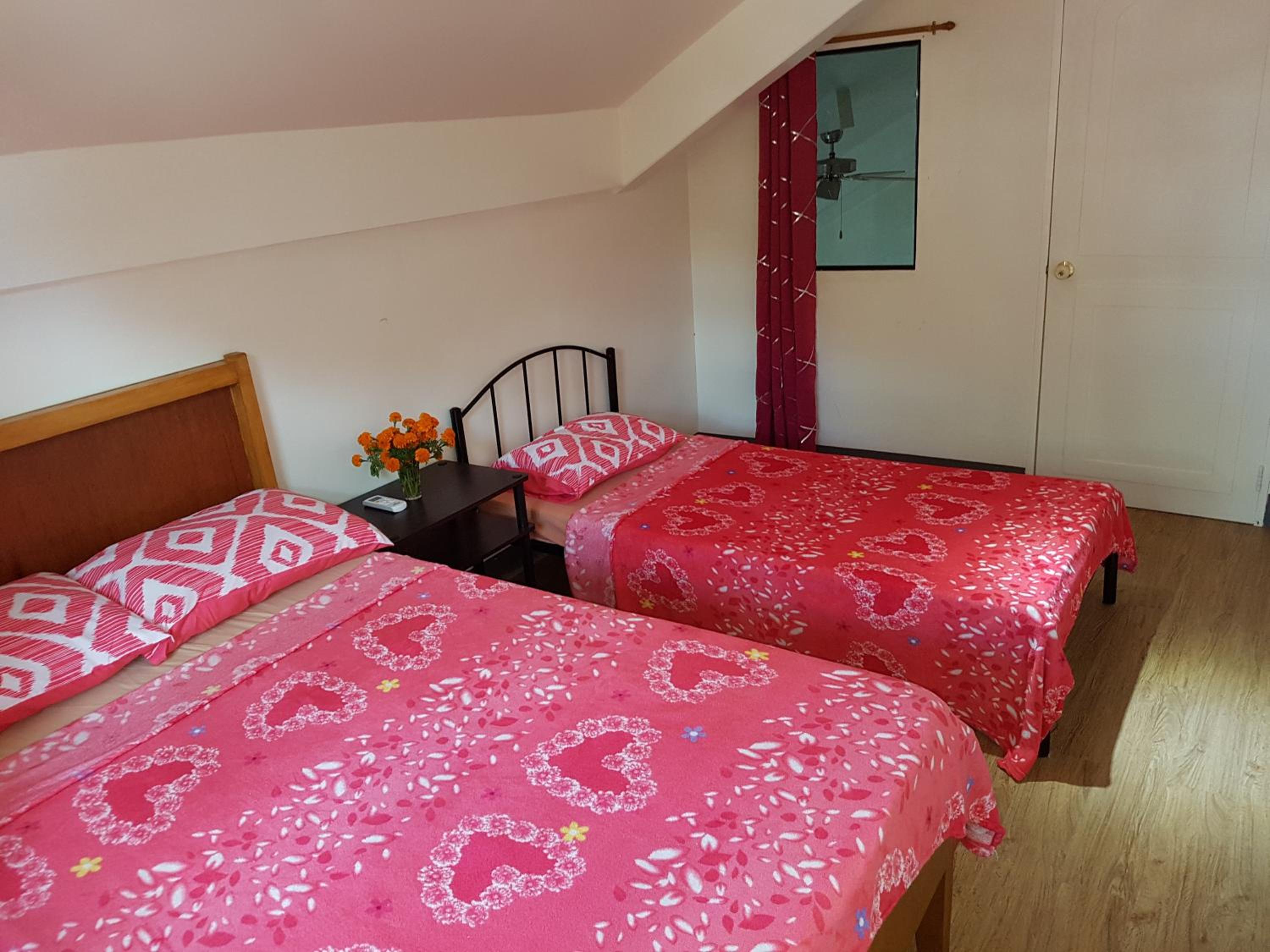 OMG Guesthouse Room for 3 Upper level view 2