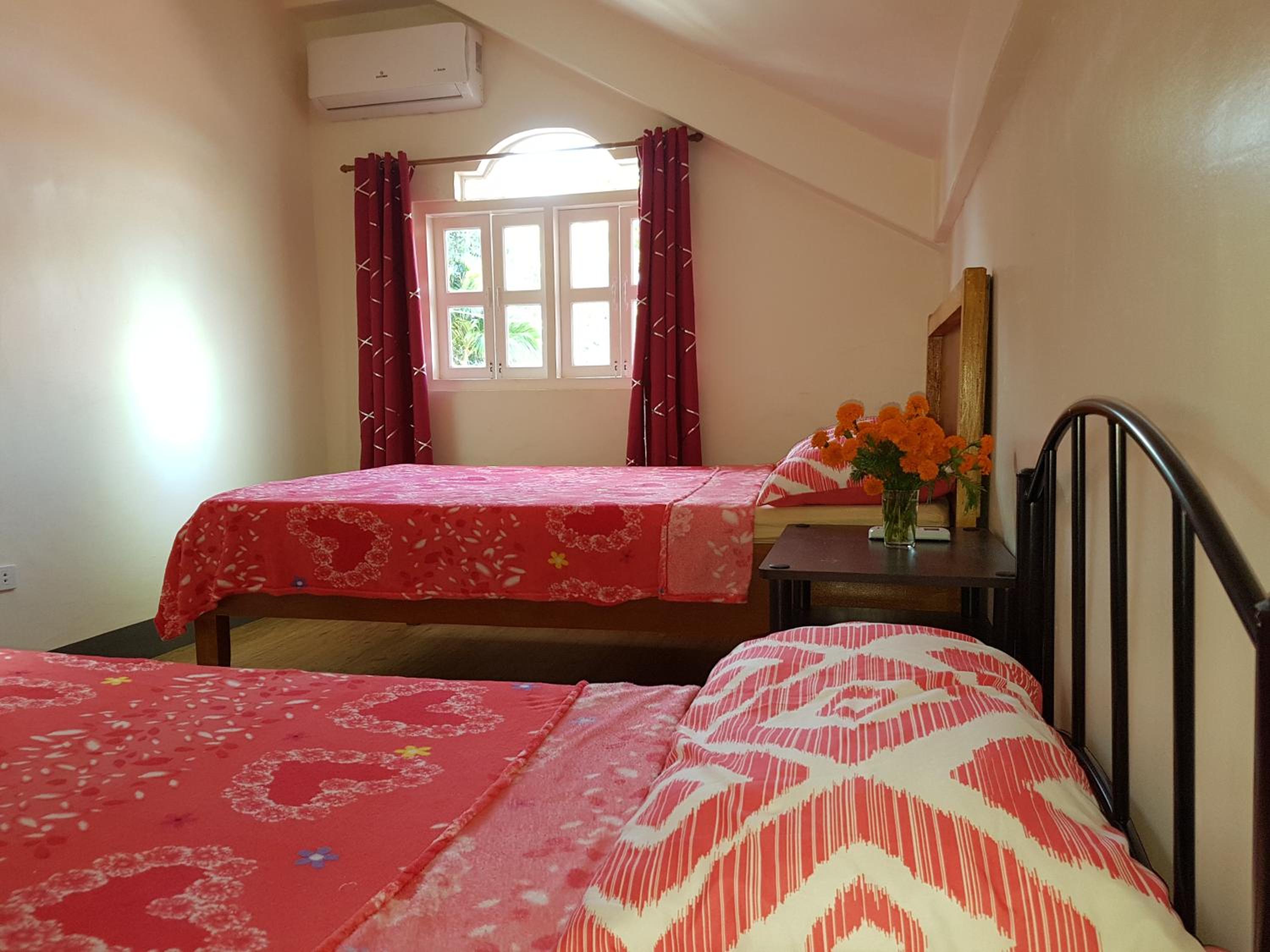 OMG Guesthouse Room for 3 Upper level view 4