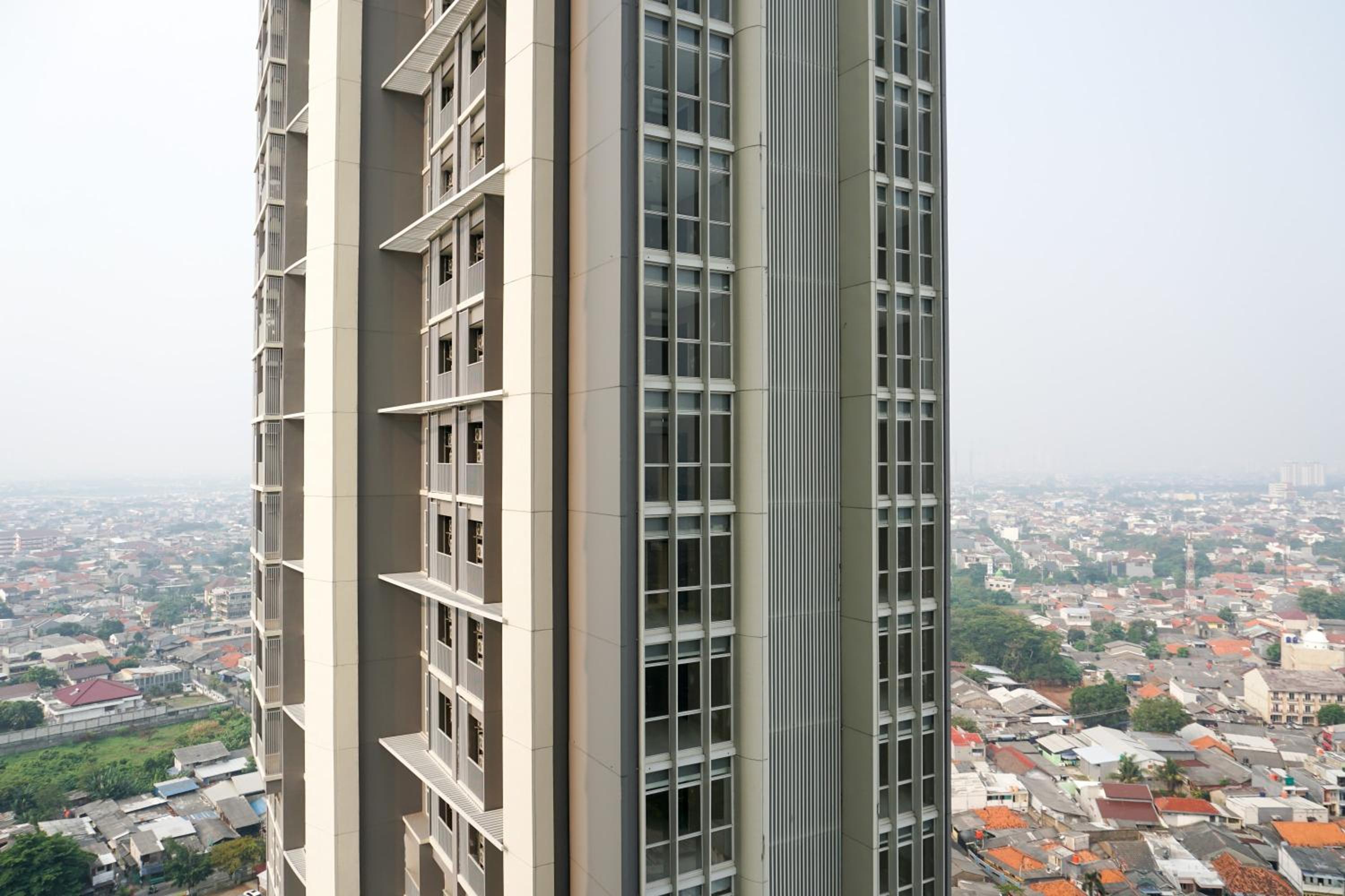 Best Location 2BR Ciputra International Apartment By Travelio
