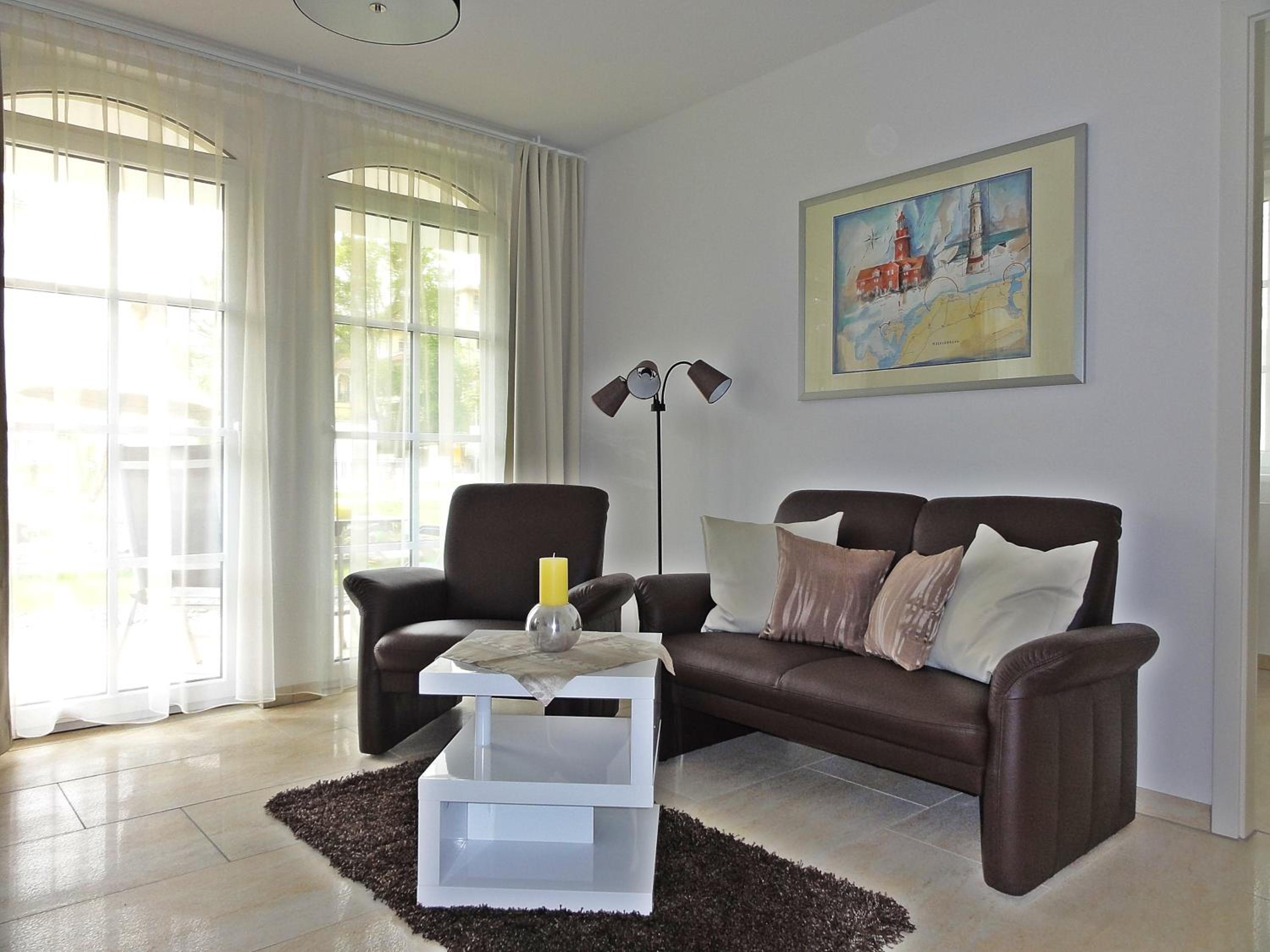3 Zimmer Ferienwohnung Haus Meeresblick mit Meerblick A005 mit Südterrasse und Strandkorb