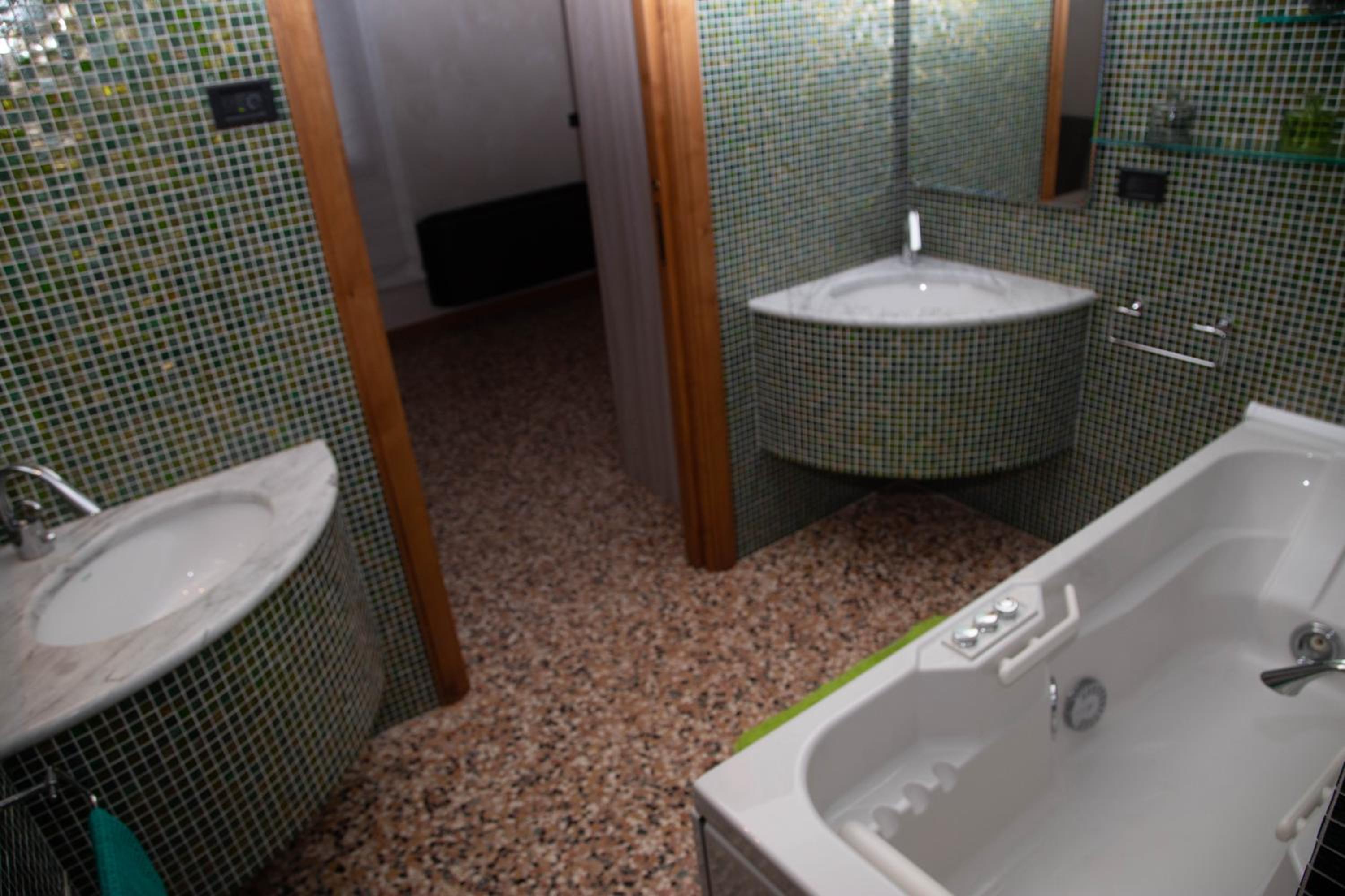 Green Apartment en Rosolina Mare — bathroom