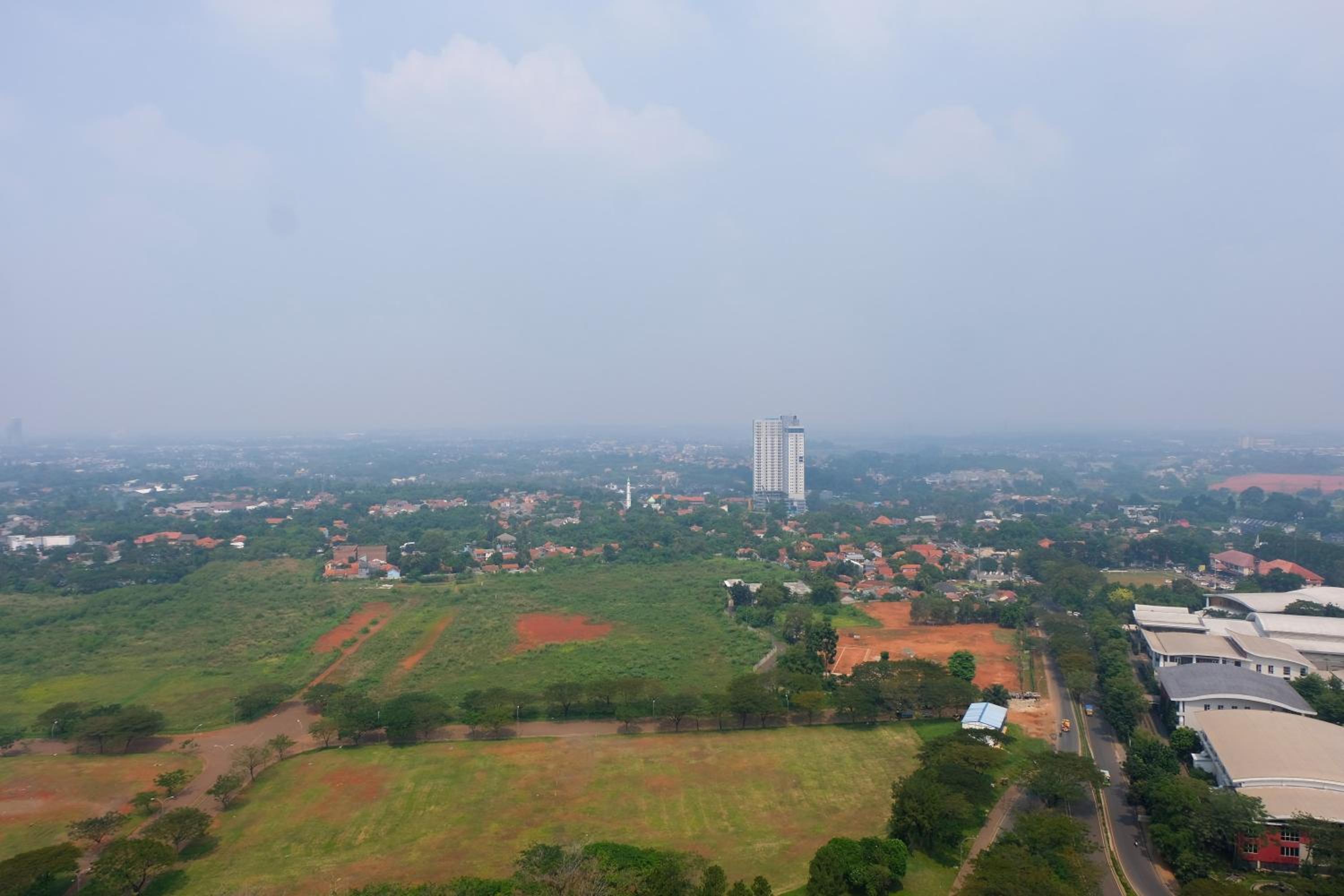 Homey Studio Room Tree Park City BSD Apartment near BSD City By Travelio