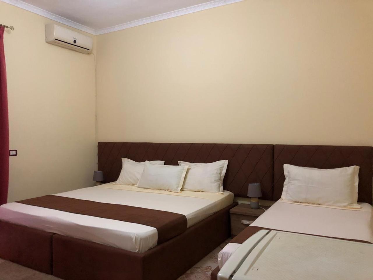 Vogli's House Apartments & Rooms