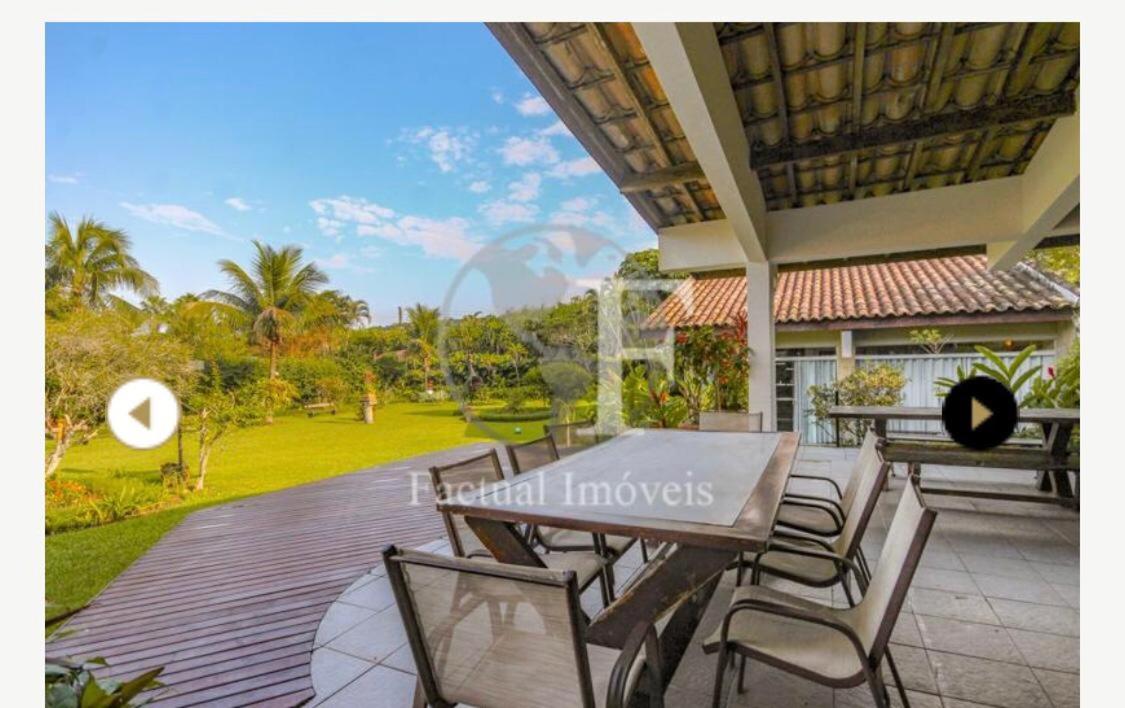 Deslumbrante casa condomínio fechado praia de Pernambuco - Guarujá