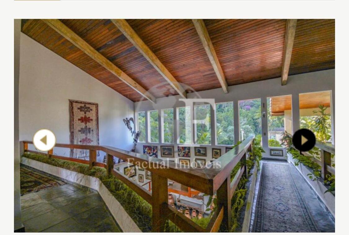 Deslumbrante casa condomínio fechado praia de Pernambuco - Guarujá