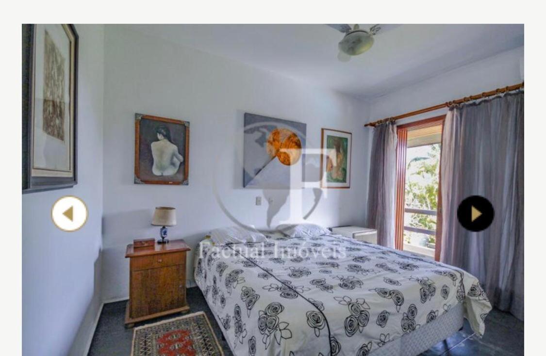 Deslumbrante casa condomínio fechado praia de Pernambuco - Guarujá